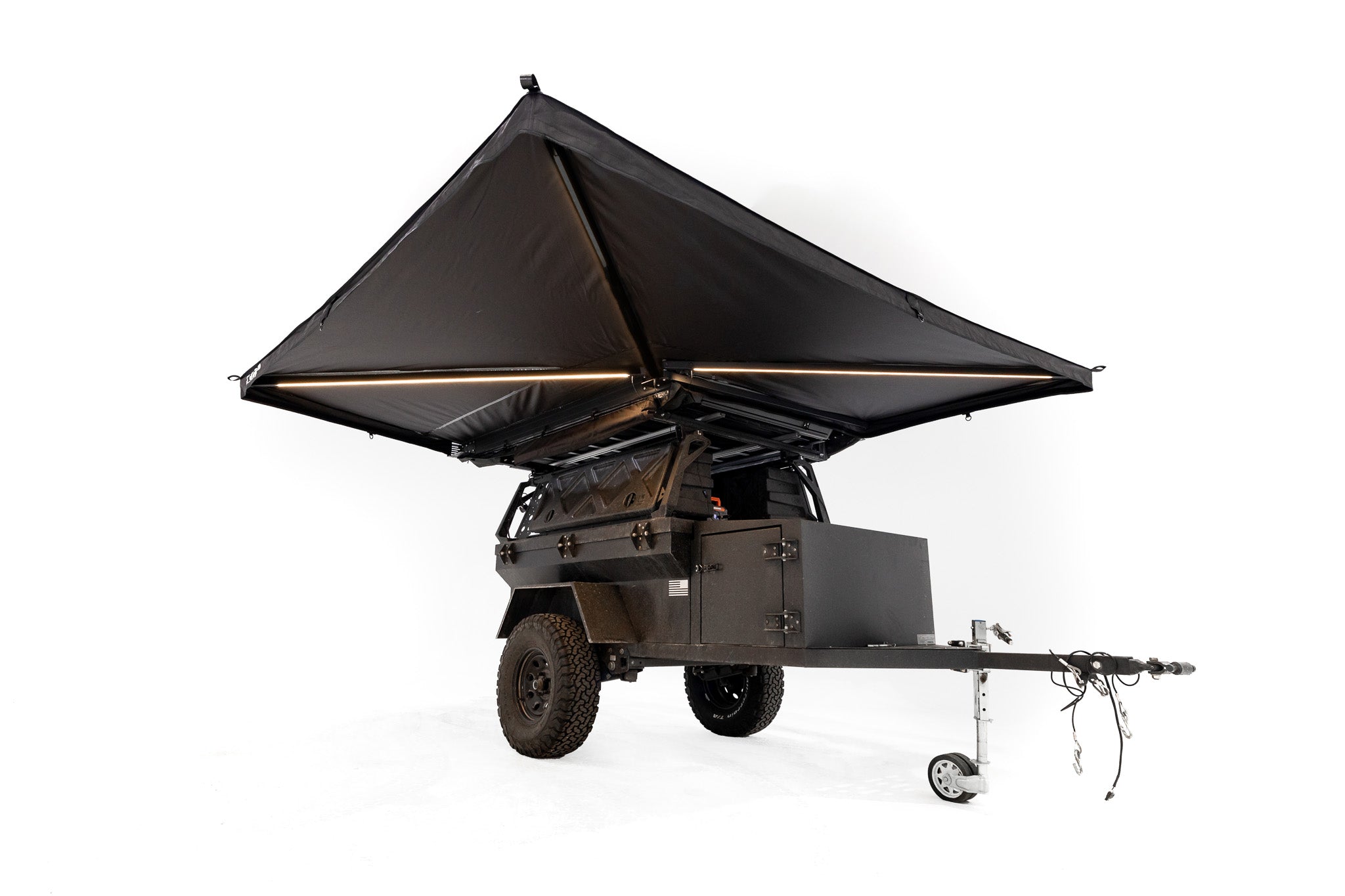 Exterior photo of 270 V2 awning displaying the freestanding capability on an overland trailer.