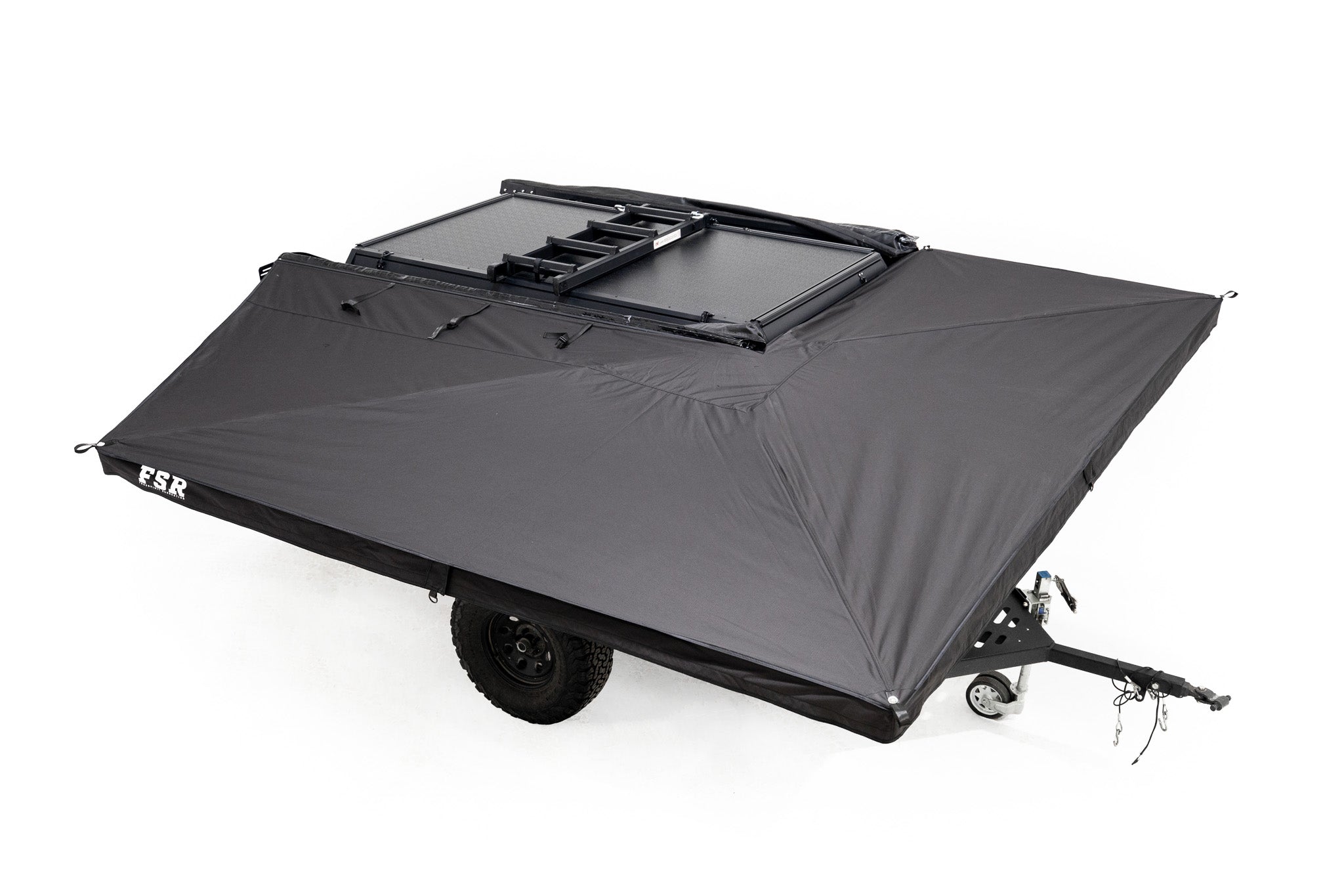 Elevated image of the 270 V2 Awning by Freespirit Recreation displayed on an Overland Trailer in white cyc photo area.