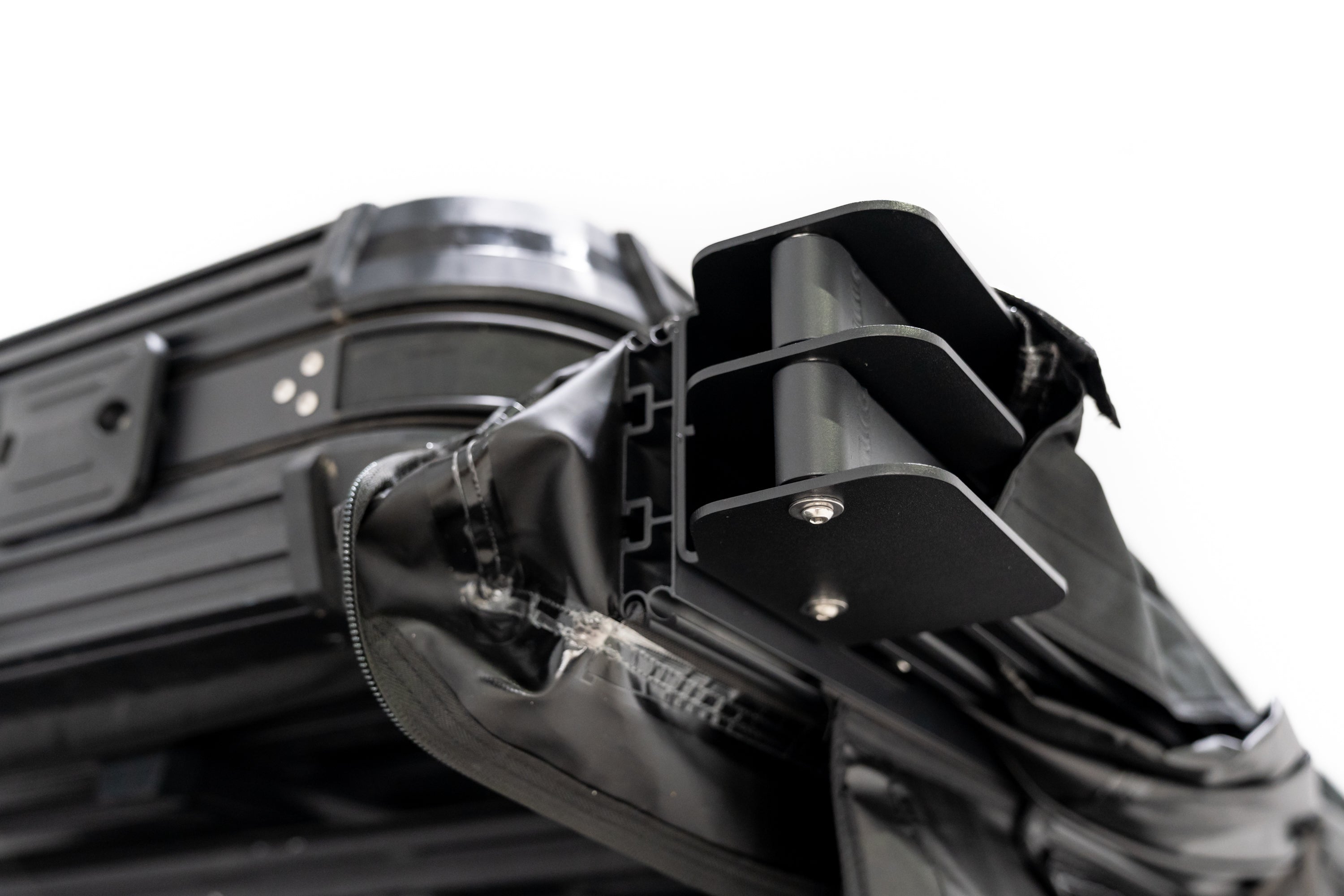 Up close photo of the awning bag opened and displaying the 270 Awning V2 hinge system.