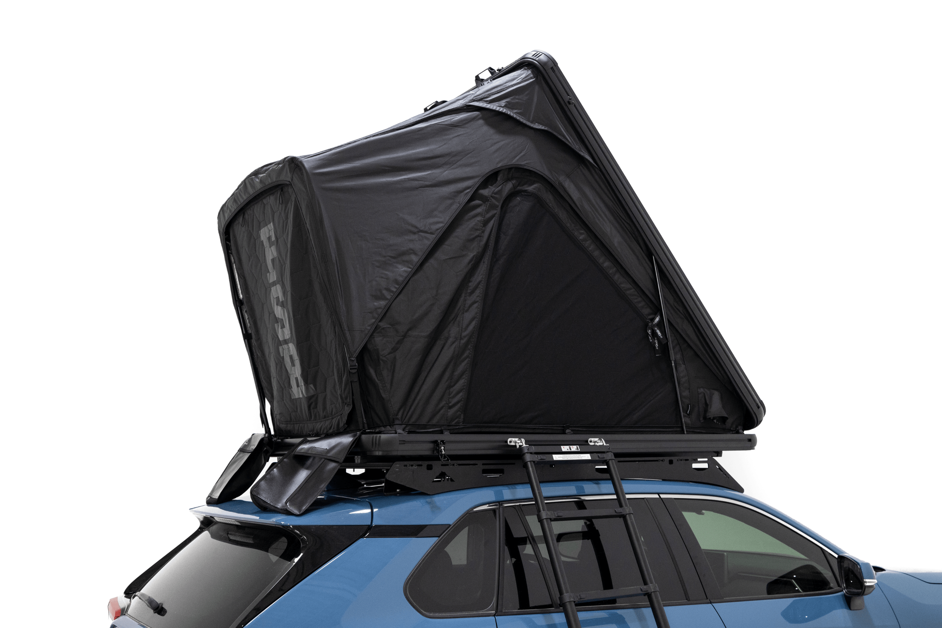 Up close photo of Aspen Lite Standard - Rooftop Tent by Freespirit Recreation mounted on Rav4 on a Sherpa platform roof rack.