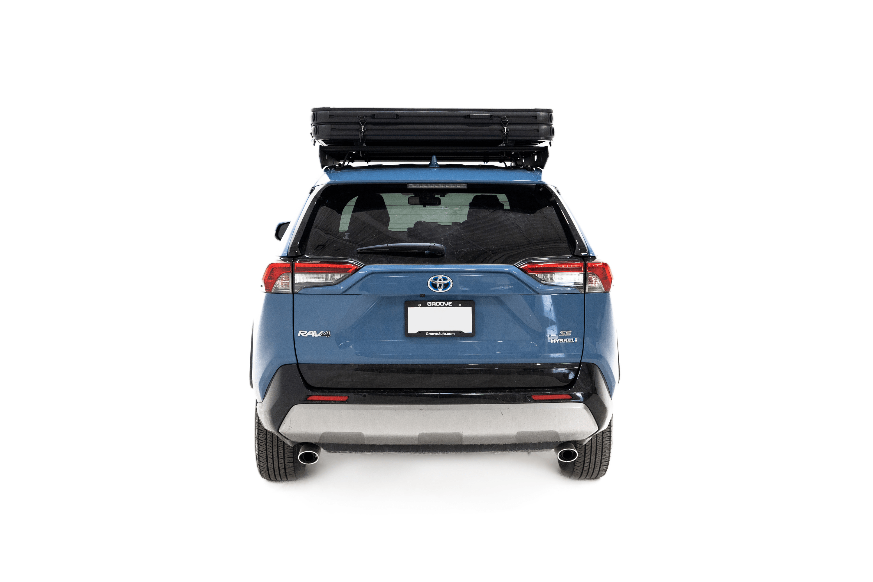 Rear photo of the Aspen Lite Standard - Rooftop Tent by Freespirit Recreation in its closed position mounted on a Toyota Rav4.