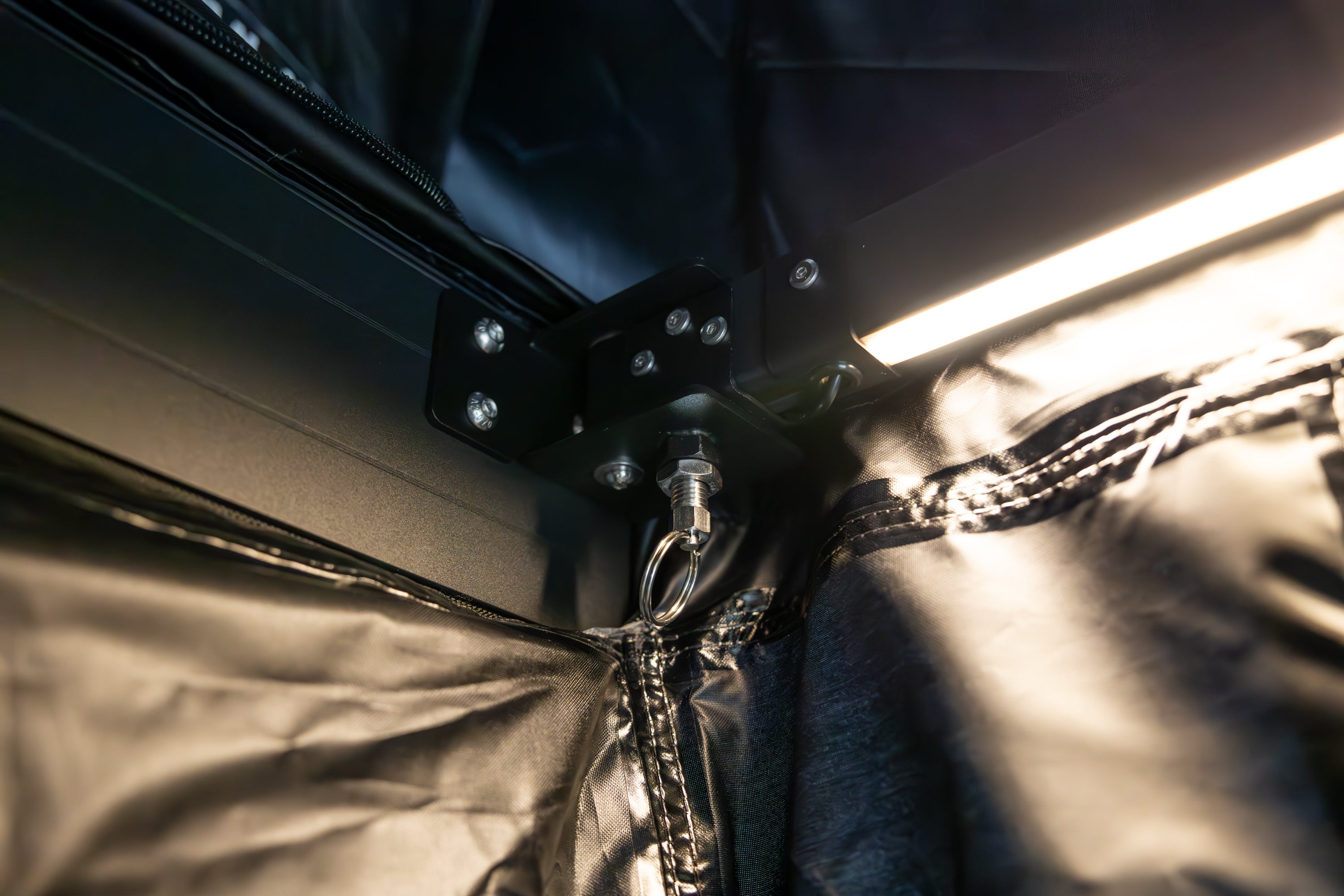 Up close photo of the locking pins for the Awn-X annex frame arms.