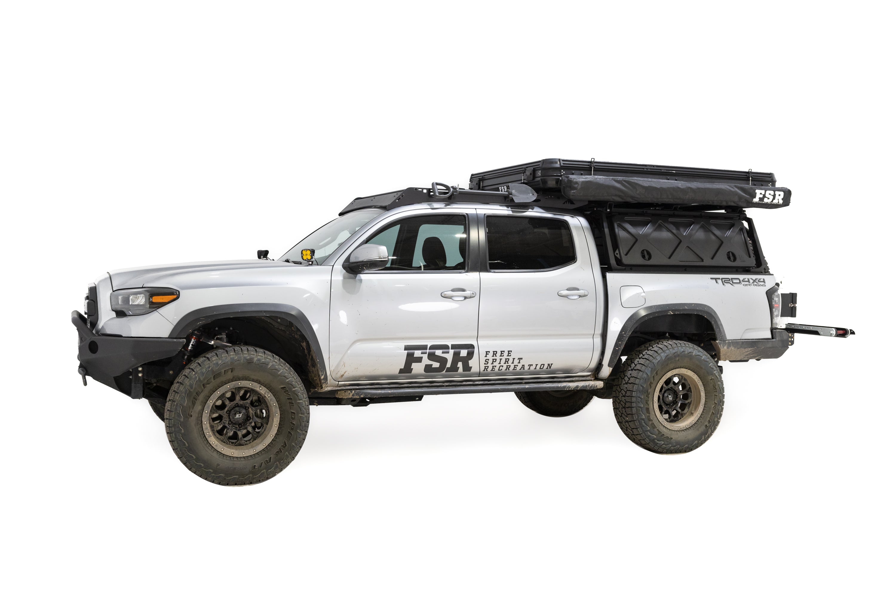 Exterior photo of Awn-X annex room stored away and closed on the side of the Evolution roof top tent mounted on a Toyota Tacoma.