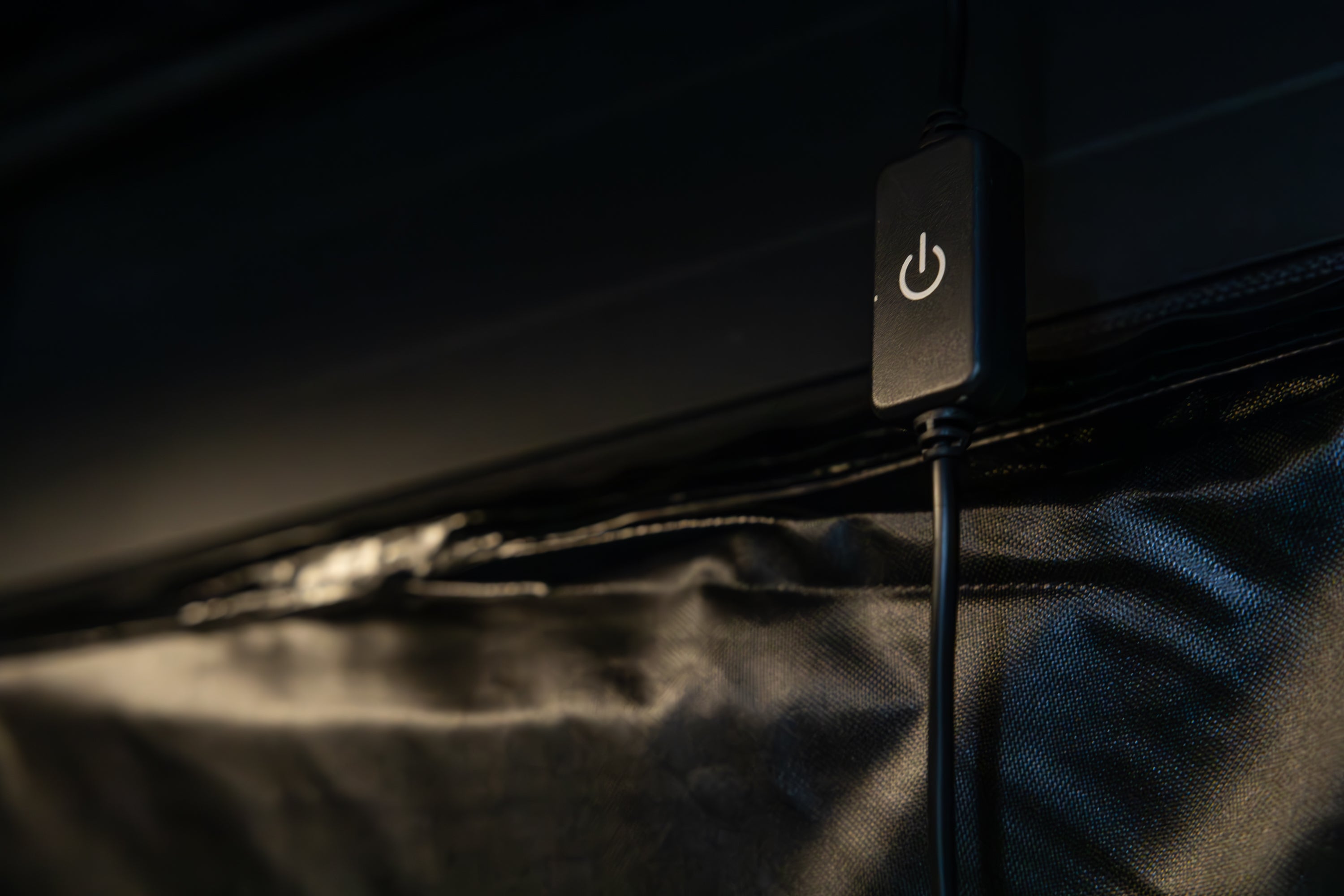 Picture of Awn-X Annex room interior arm dimmable light switch in close detail.