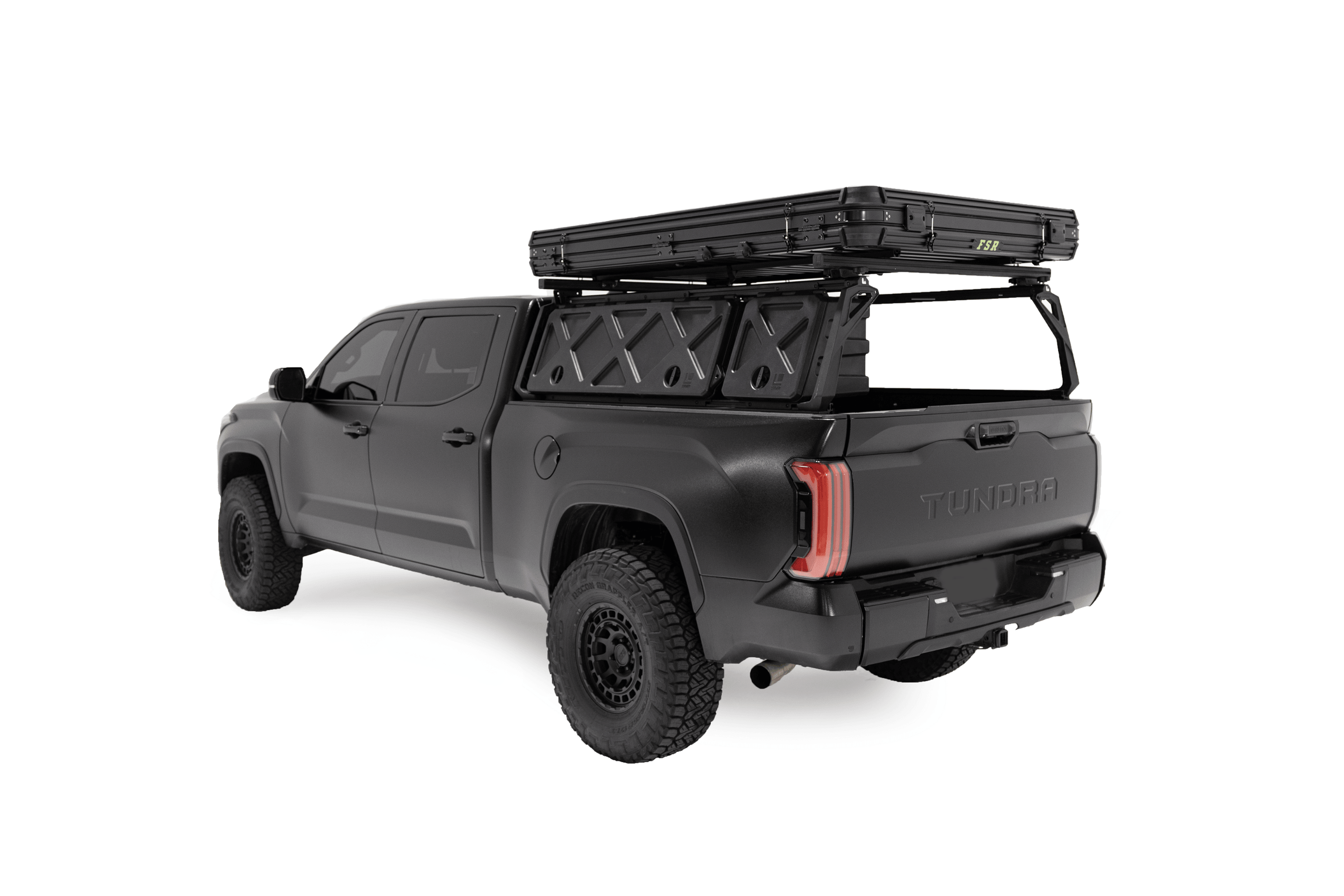 Rear 45 degree angle photo of the Evolution V2 XL - Rooftop Tent by Freespirit Recreation on a black Toyota Tundra.