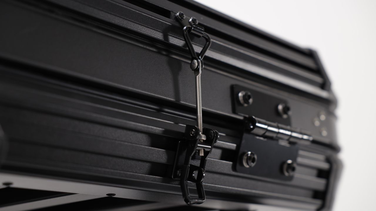 Up close photo of the Evolution V2 Standard latch system on the exterior of the tent.