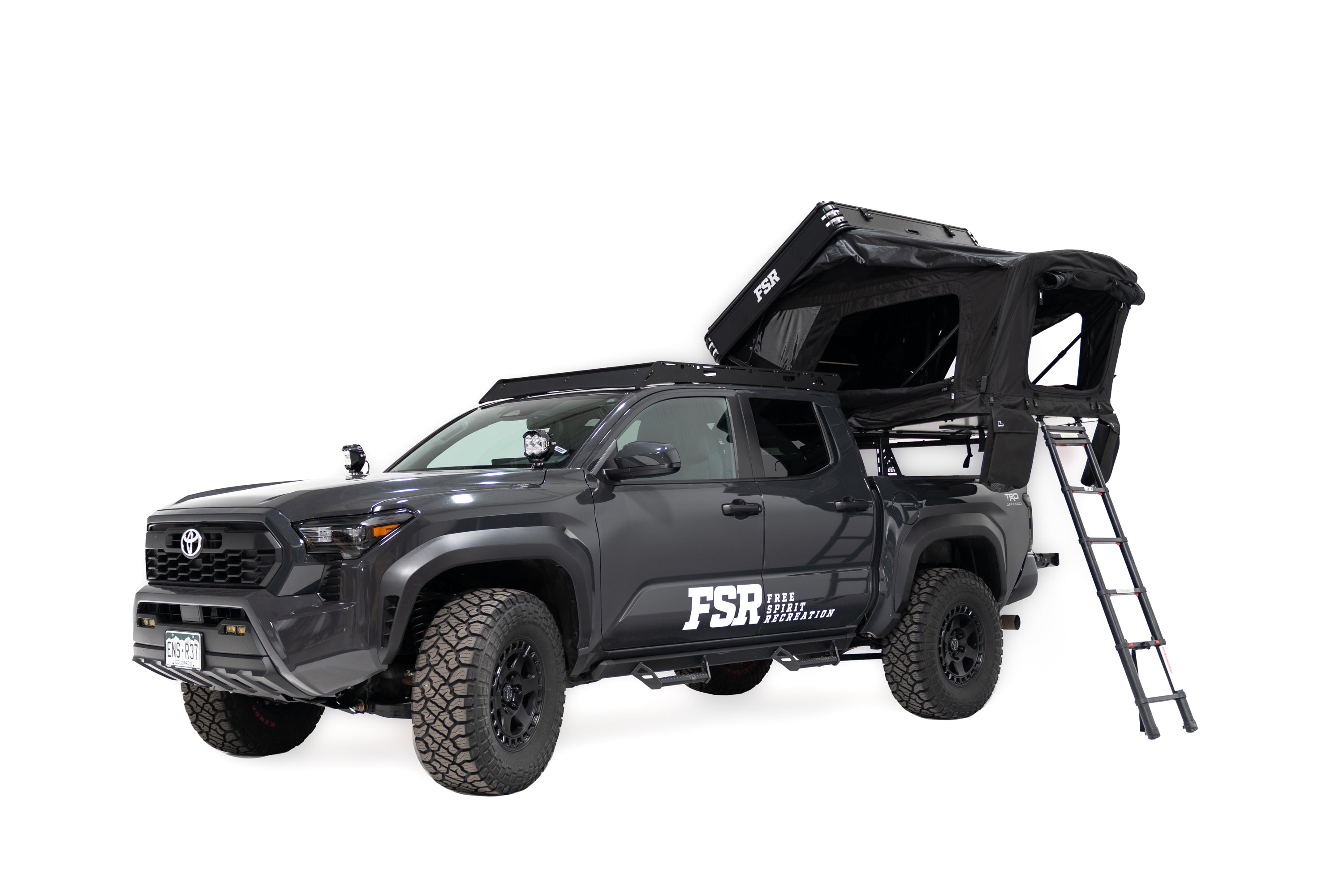 Exterior Photo of Kali hardshell rooftop tent by FSR - Deployed on the truck bed of a 4th gen Toyota Tacoma.
