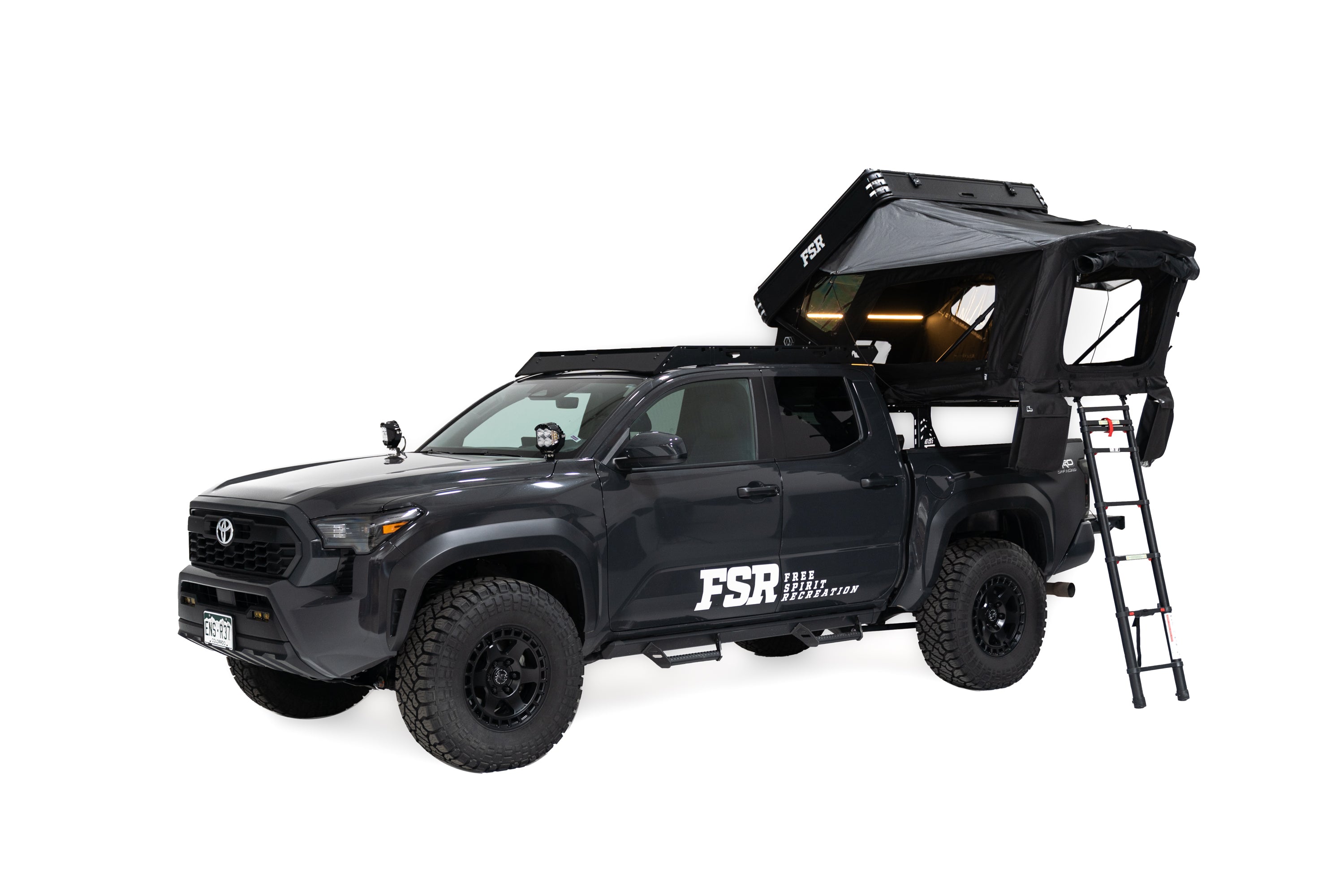 45 degree angle Exterior Photo of Kali hardshell rooftop tent by FSR - Deployed on the truck bed of a 4th gen Toyota Tacoma.