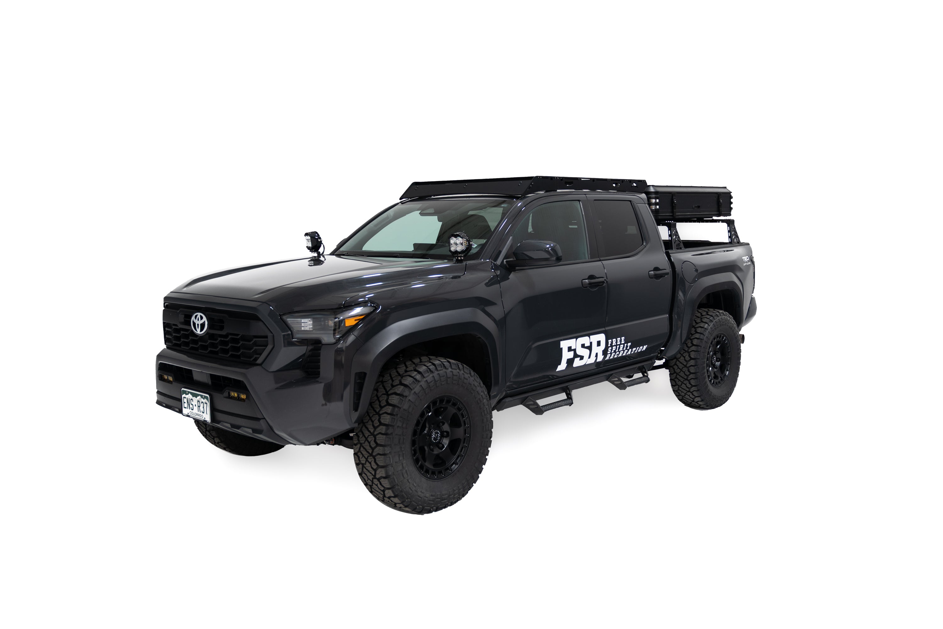 Exterior Photo of Kali hardshell rooftop tent by FSR - Closed on the truck bed of a 4th gen Toyota Tacoma.