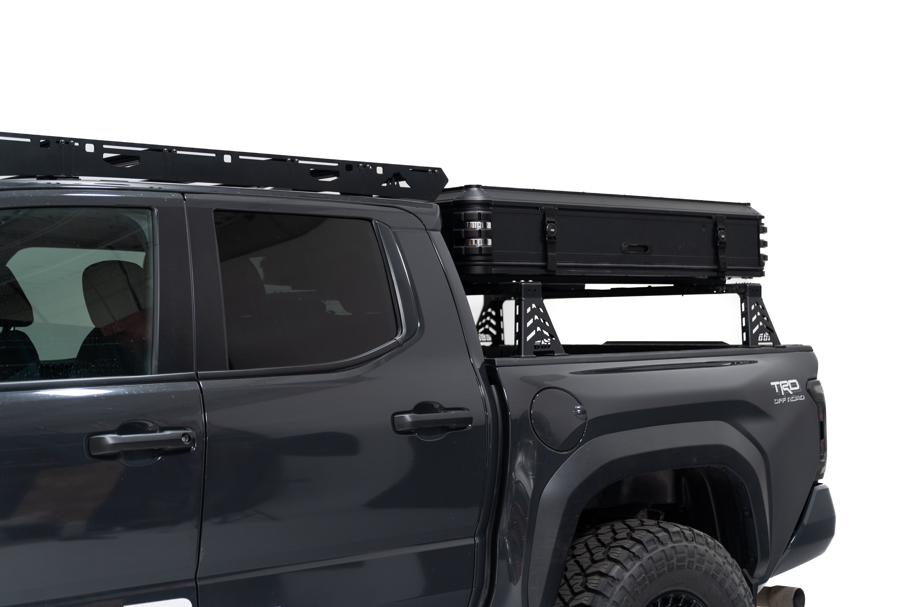 Close up angle Exterior Photo of Kali hardshell rooftop tent by FSR - Closed on the truck bed of a 4th gen Toyota Tacoma.