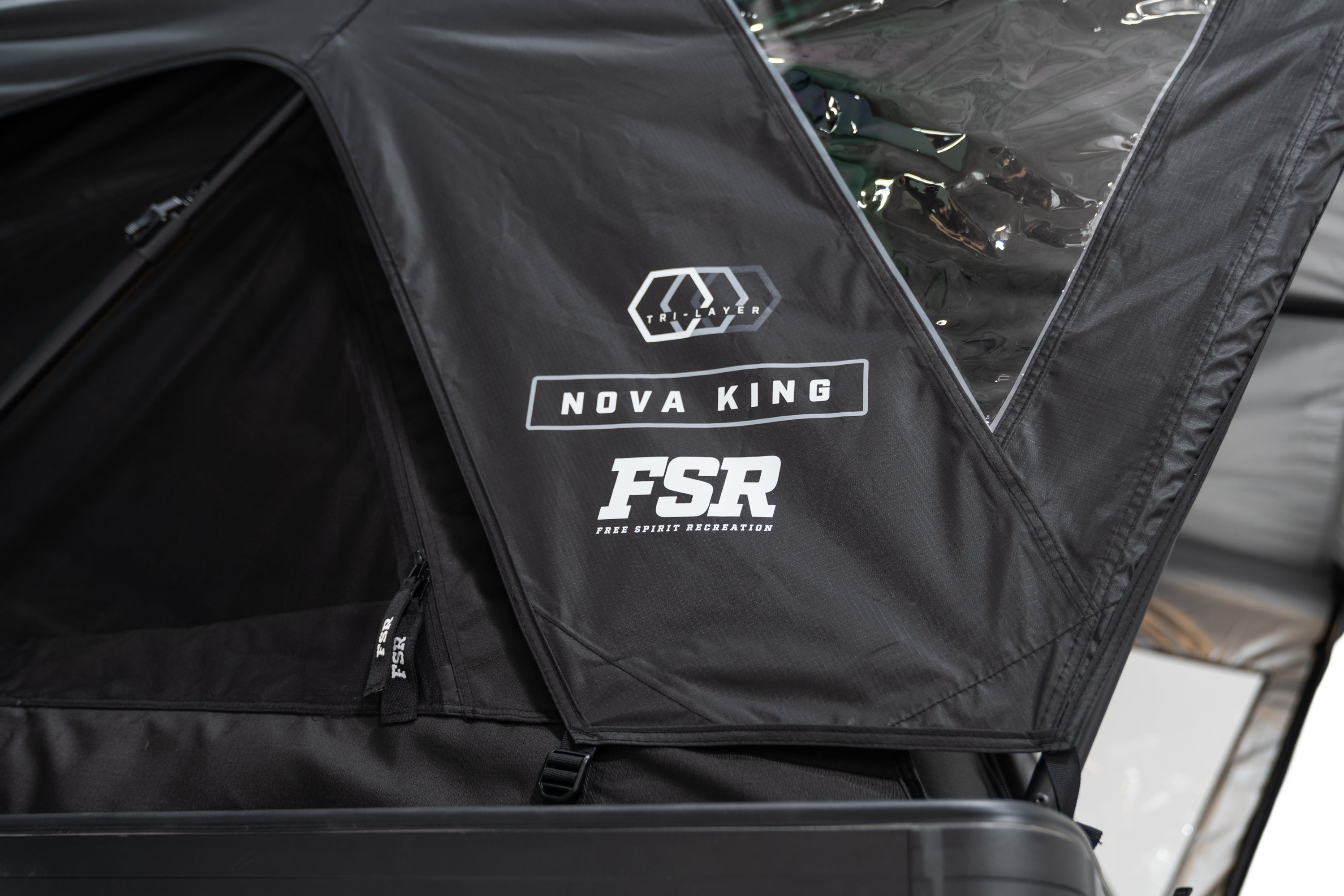 Exterior Close up photo of the Nova King rooftop tent branding.