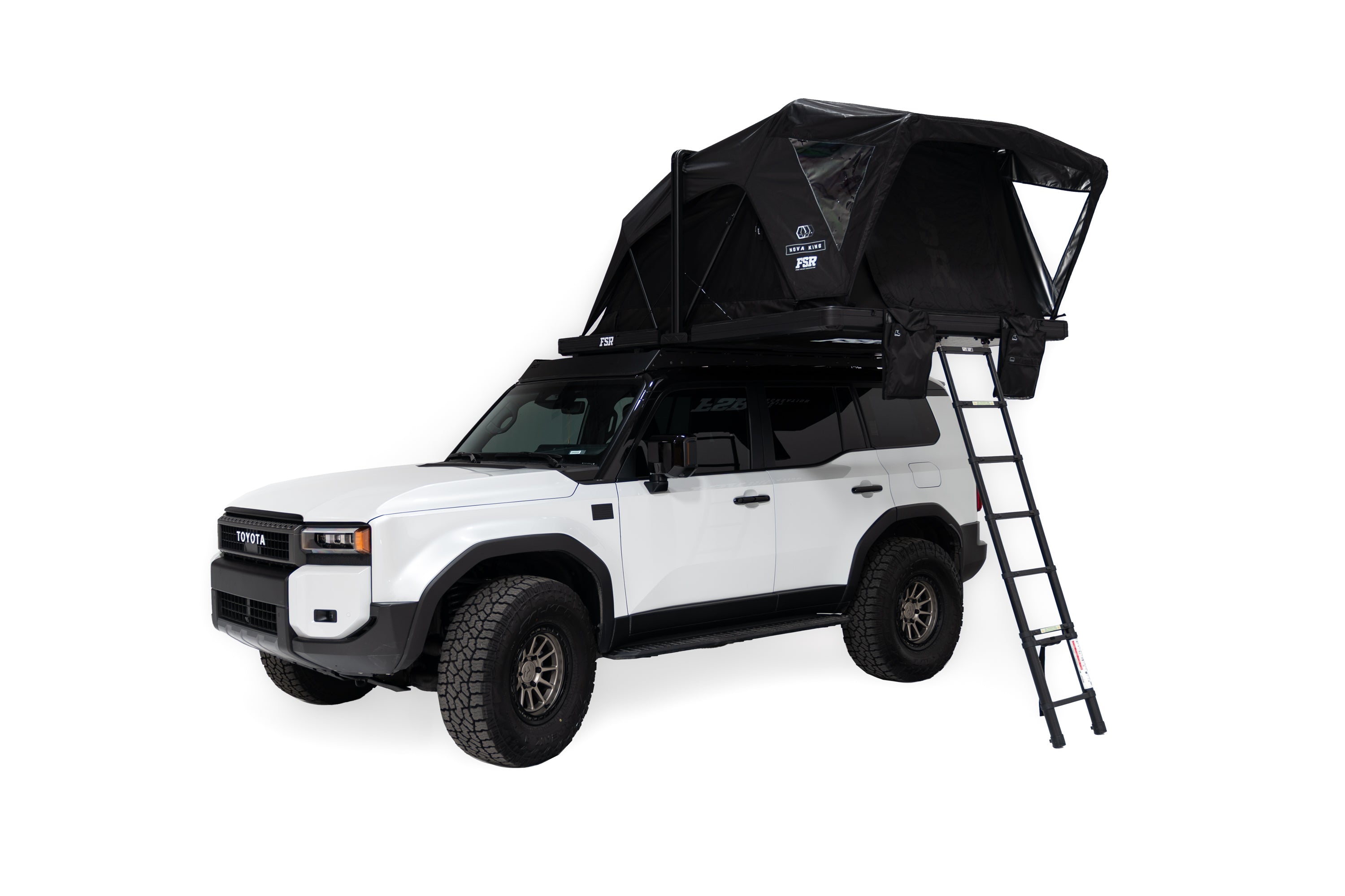 Exterior photo of the deployed Nova King rooftop tent mounted on a white Toyota land cruiser.
