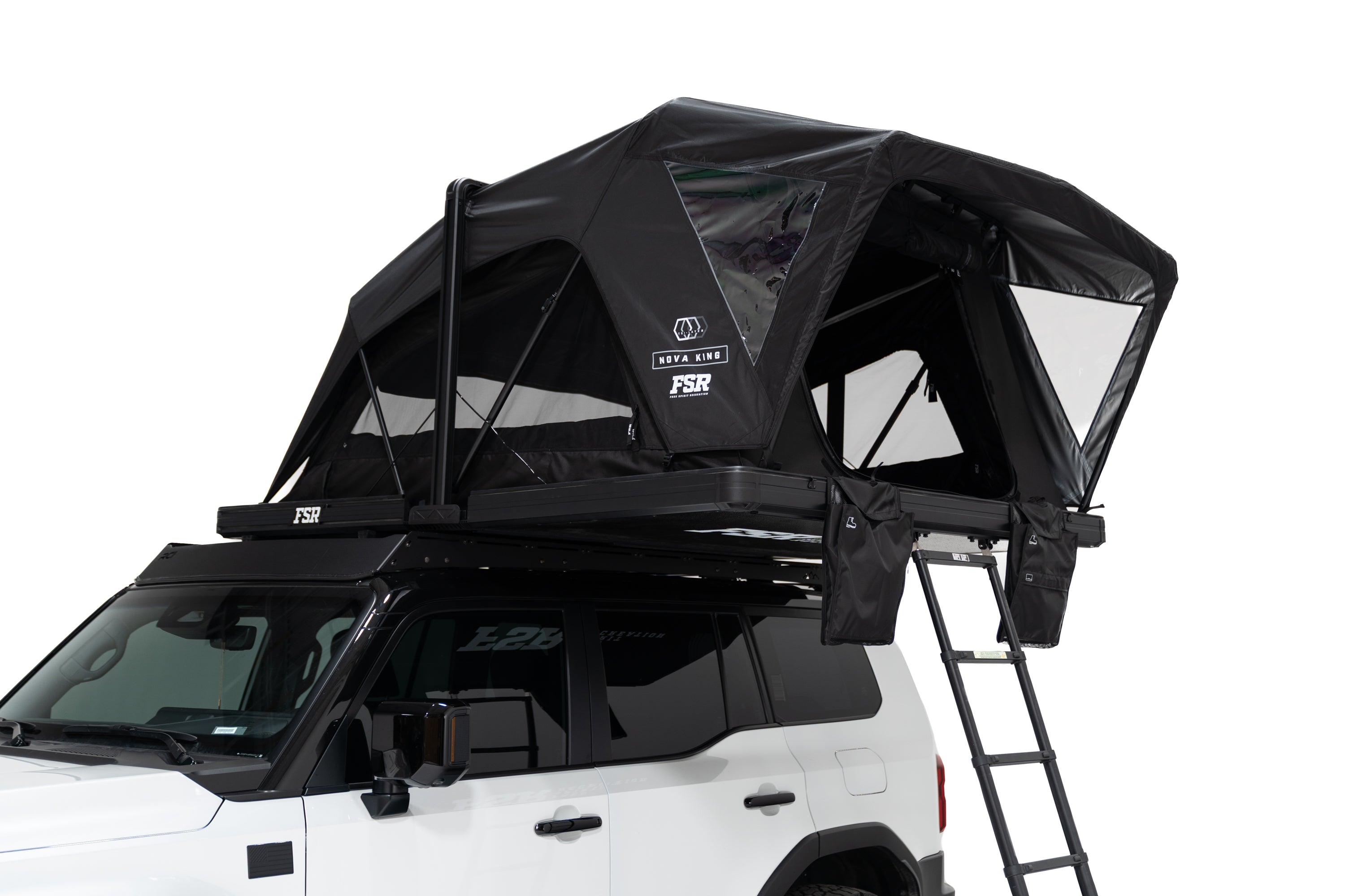 Close up Exterior photo of the Nova King rooftop tent mounted on a white Toyota land cruiser with the tent windows open.