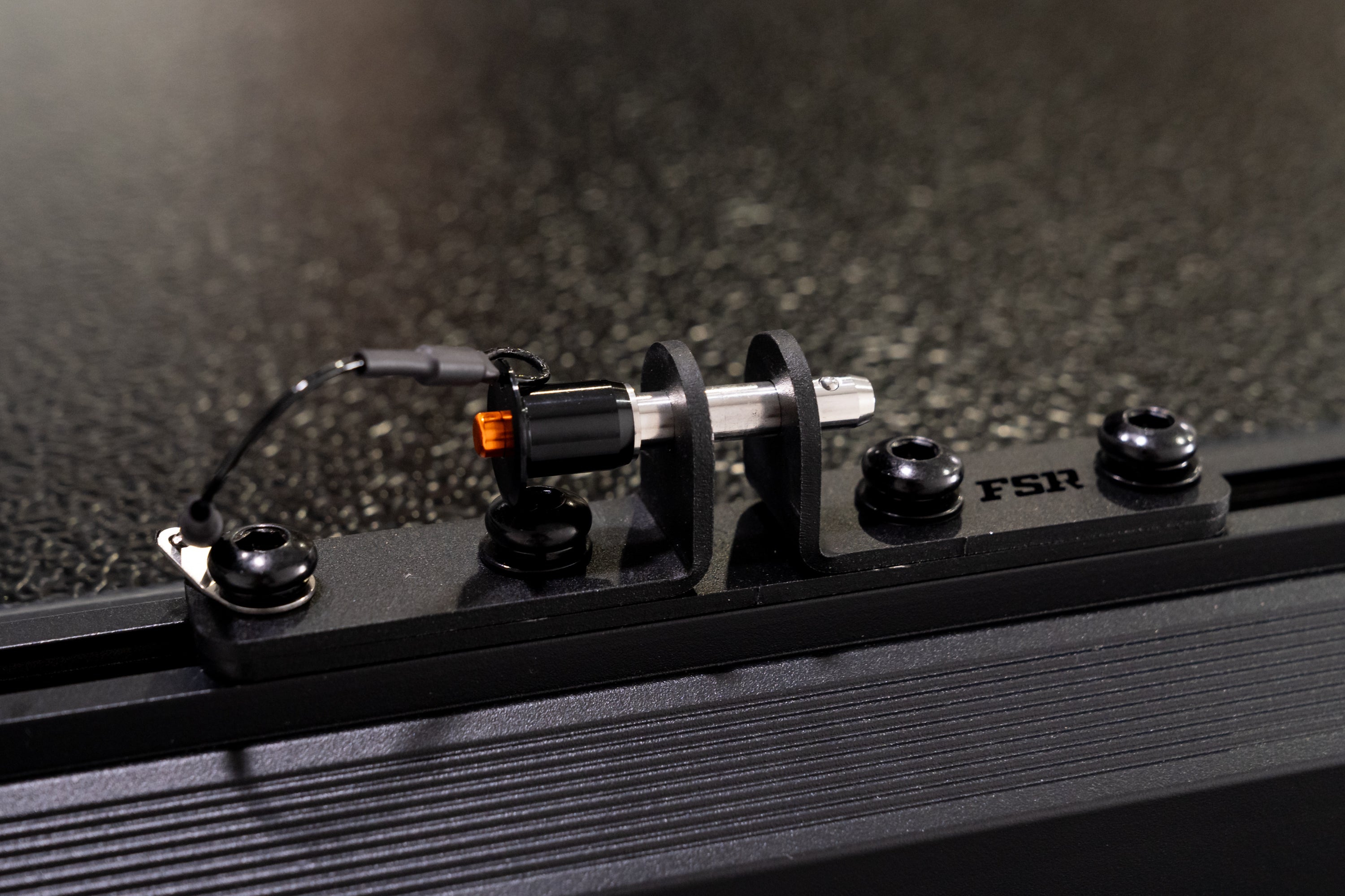 Up close photo of the ladder pin on the FSR Nova rooftop tent.