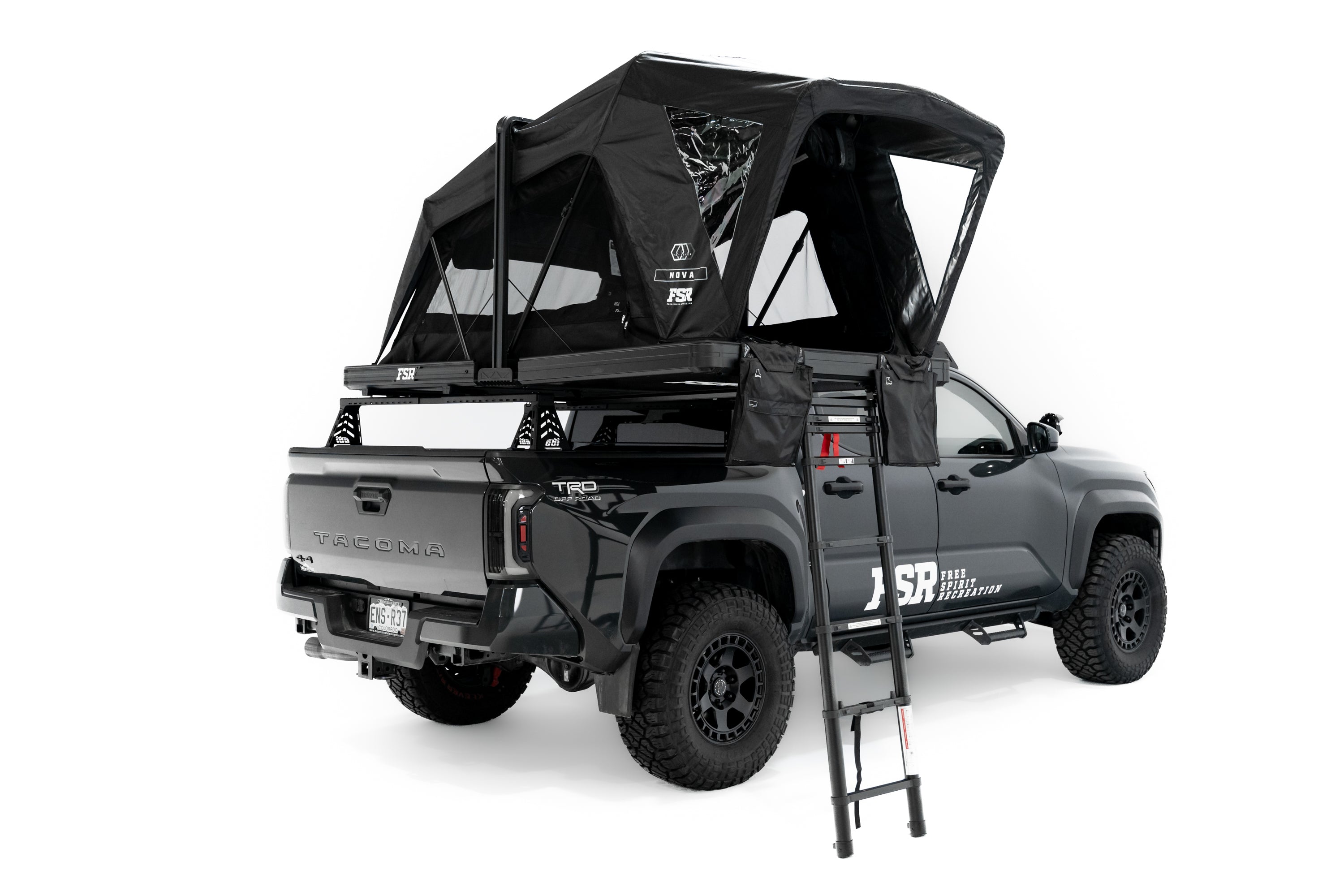 Rear angle photo of Nova Hybrid rooftop tent deployed on the rear of a 2025 Toyota Tacoma.
