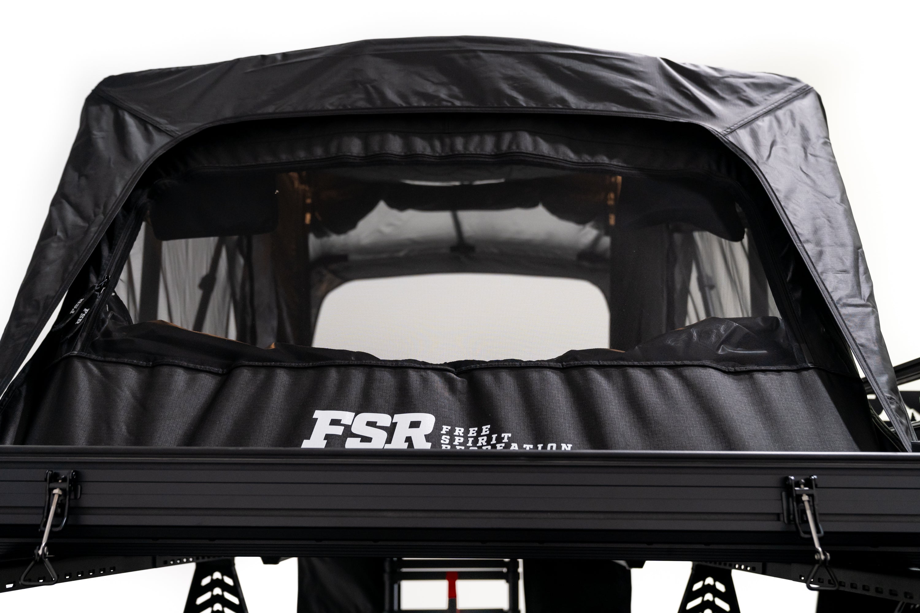 Rear exterior Photo of Nova Hybrid rooftop tent deployed on the rear of a 2025 Toyota Tacoma.