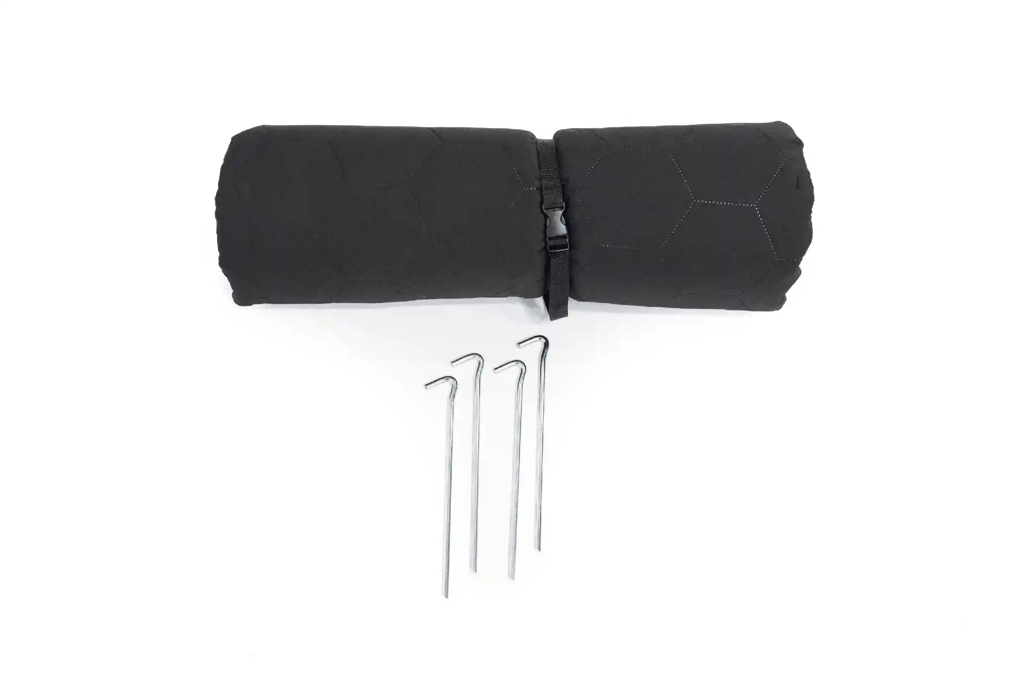 FSR Anywhere Camping Mat rolled up with storage strap and included ground pad stakes on a white background
