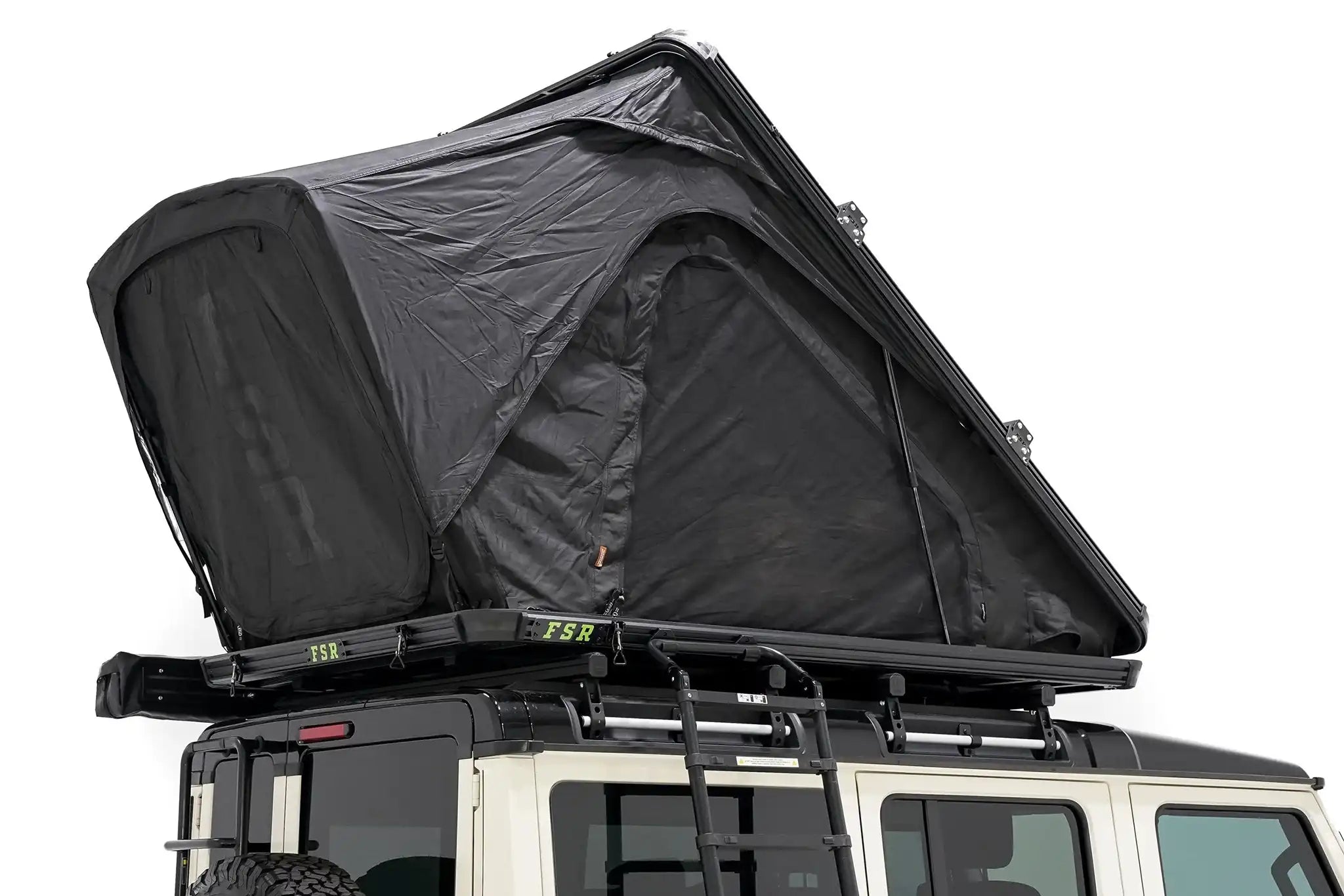 Image of the exterior of the FSR Aspen Pro XL roof top tent from Freespirit Recreation installed and deployed on the roof rack of an Ineos Grenadier