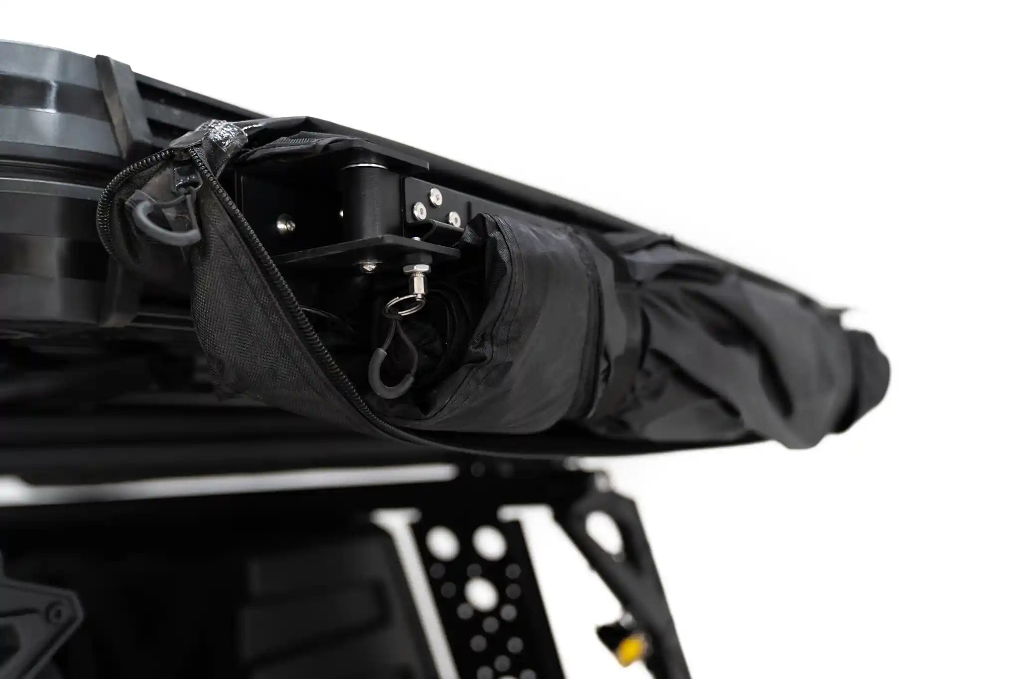 Close-up of the fully collapsed FSR Shower Awning from Free Spirit Recreation wlth storage bag unzipped