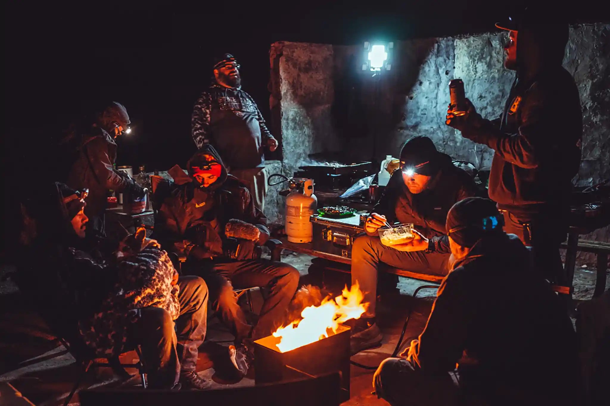 FSR crew cooking a meal while setup at a basecamp in Death Valley while camping and overlanding as a group