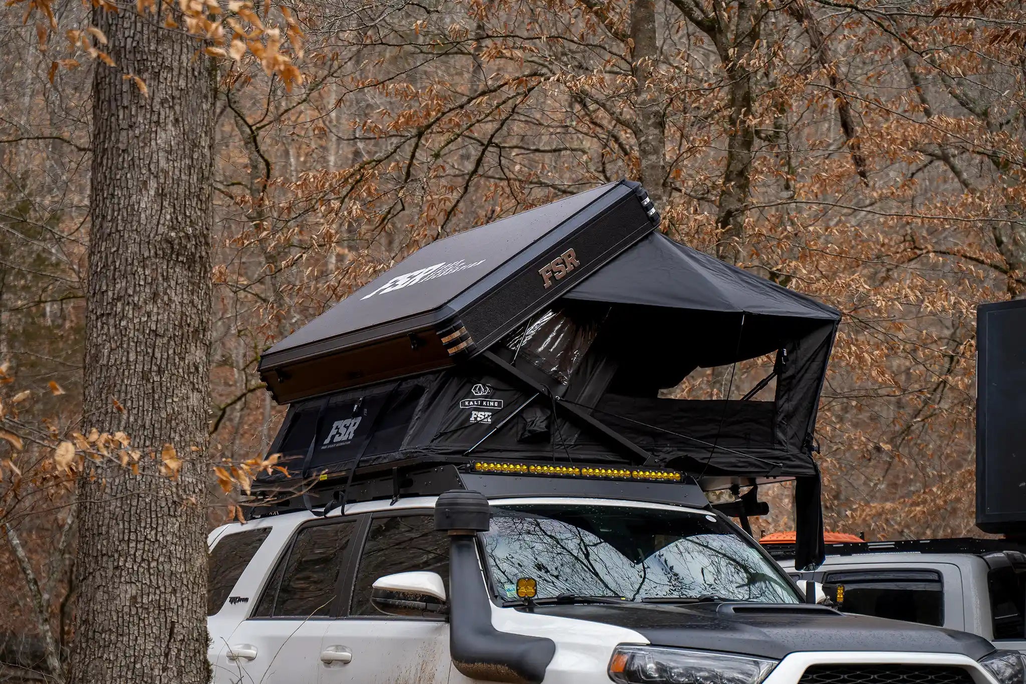 FSR Kali King Rooftop Tent from Free Spirit Recreation setup and in use on an overland Toyota 4Runner while camping