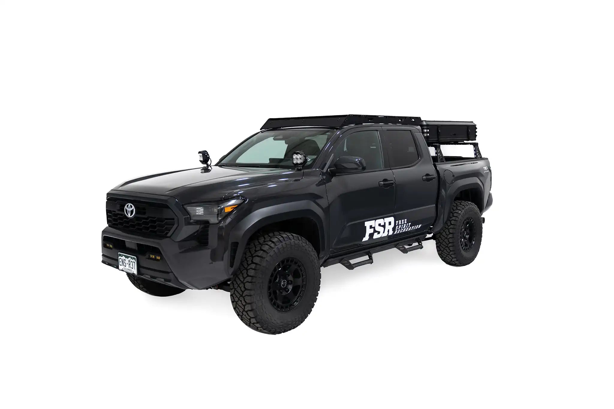 Exterior Photo of Kali hardshell rooftop tent by FSR - Closed on the truck bed rack of a 4th gen Toyota Tacoma.