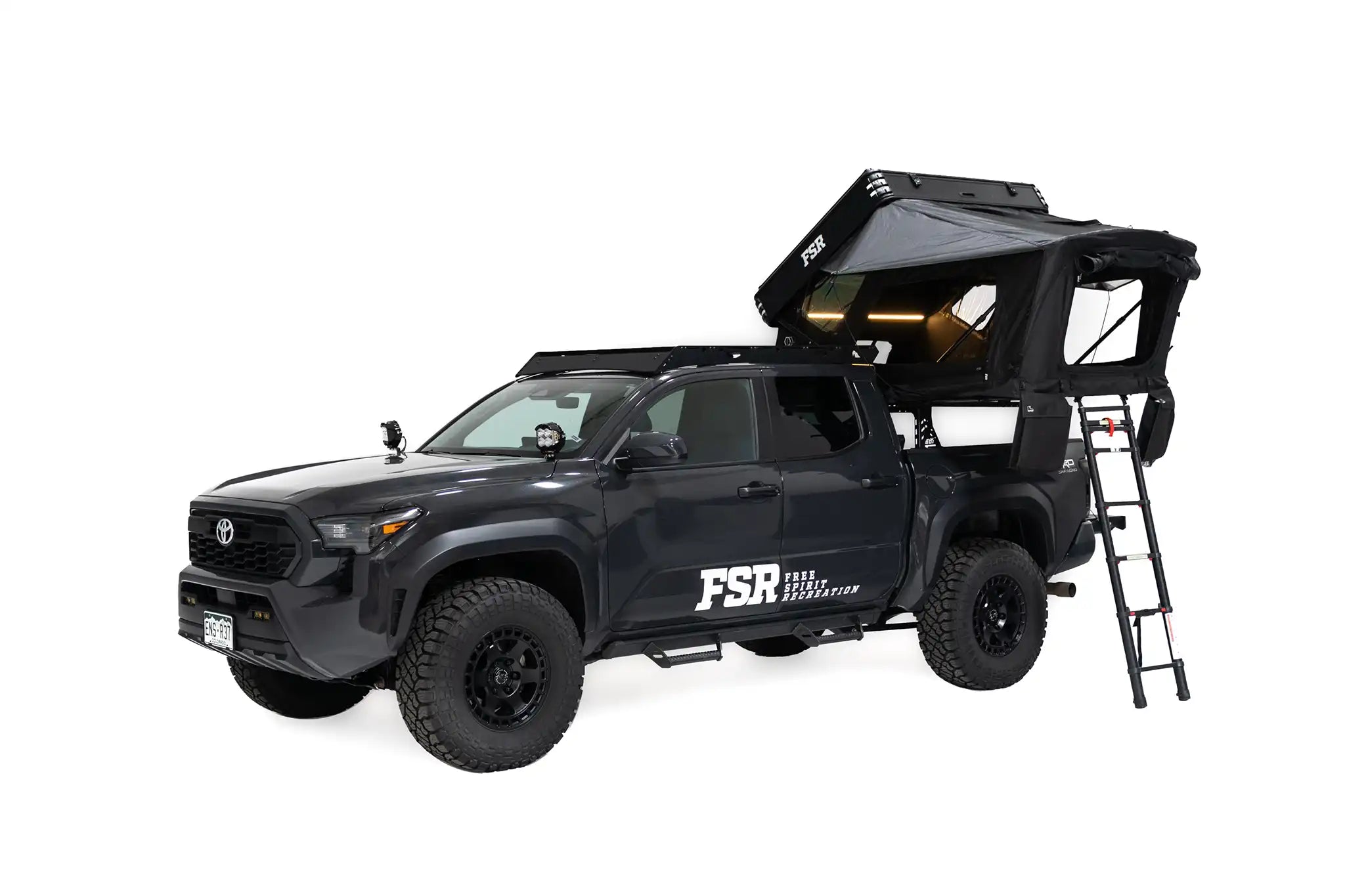 45-degree angle exterior photo of FSR Kali hardshell rooftop tent installed on a Toyota Tacoma truck bed rack.