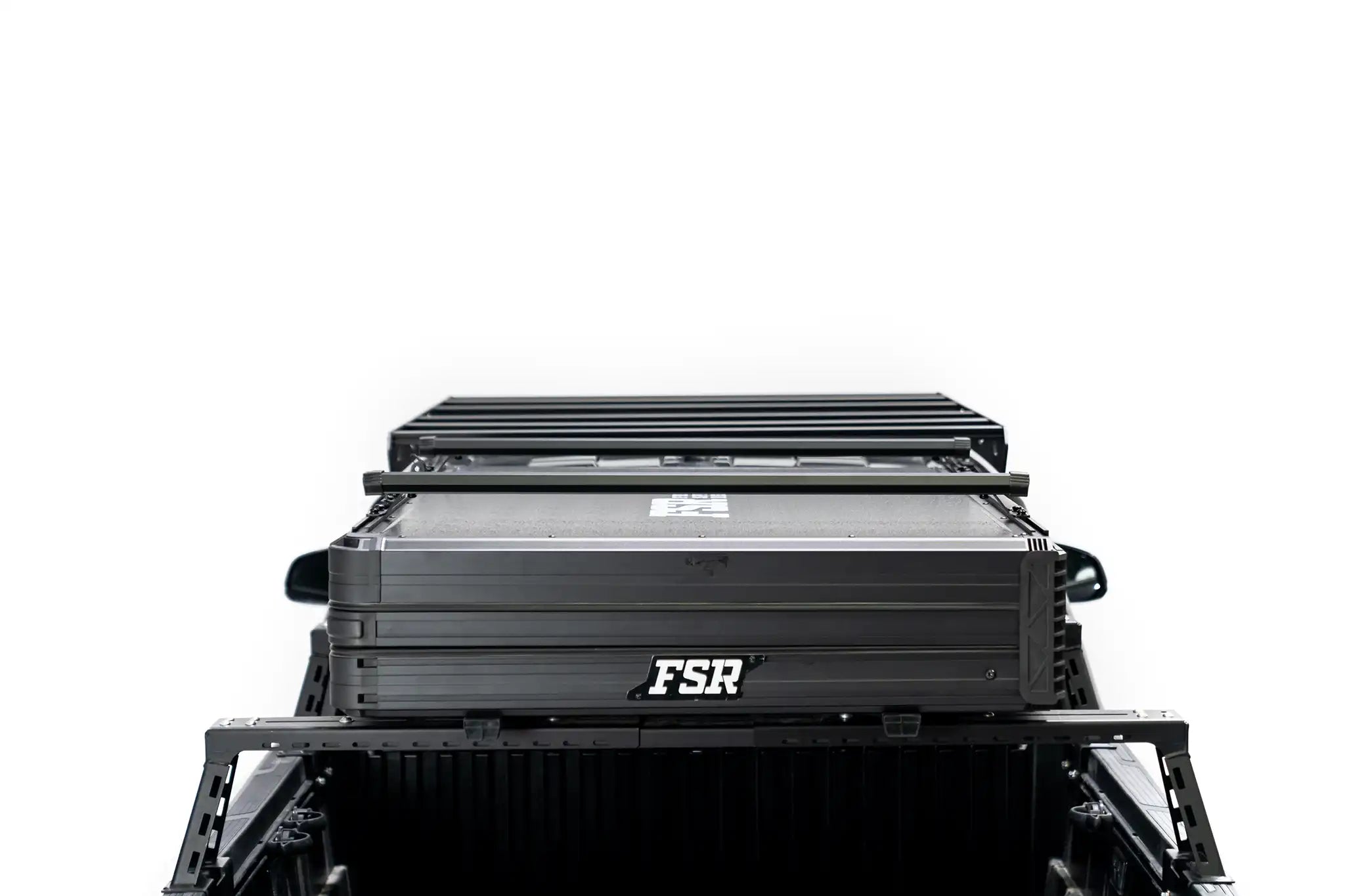 Rear Up close photo of FSR Nova rooftop tent closed with crossbars installed