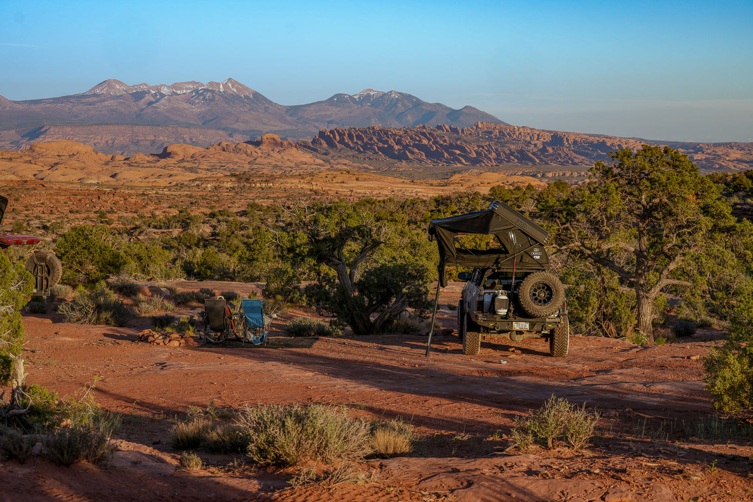 Kali roof top tent from Freespirit Recreation mounted on an overlanding short bed Tacoma pickup truck. 