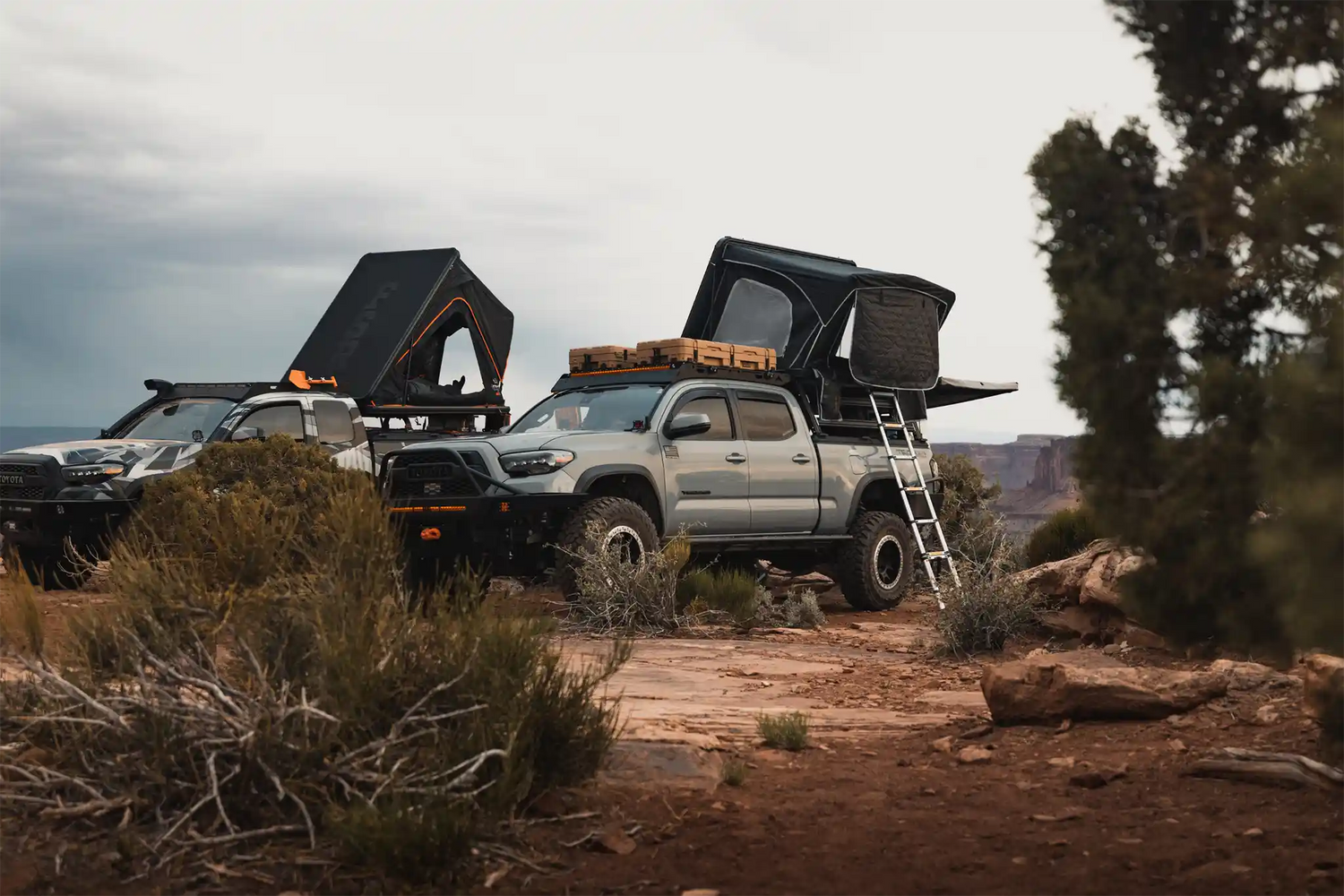 Two Toyota Tacomas equipped with FSR's Tacoma Roof Top Tents from Free Spirit Recreation
