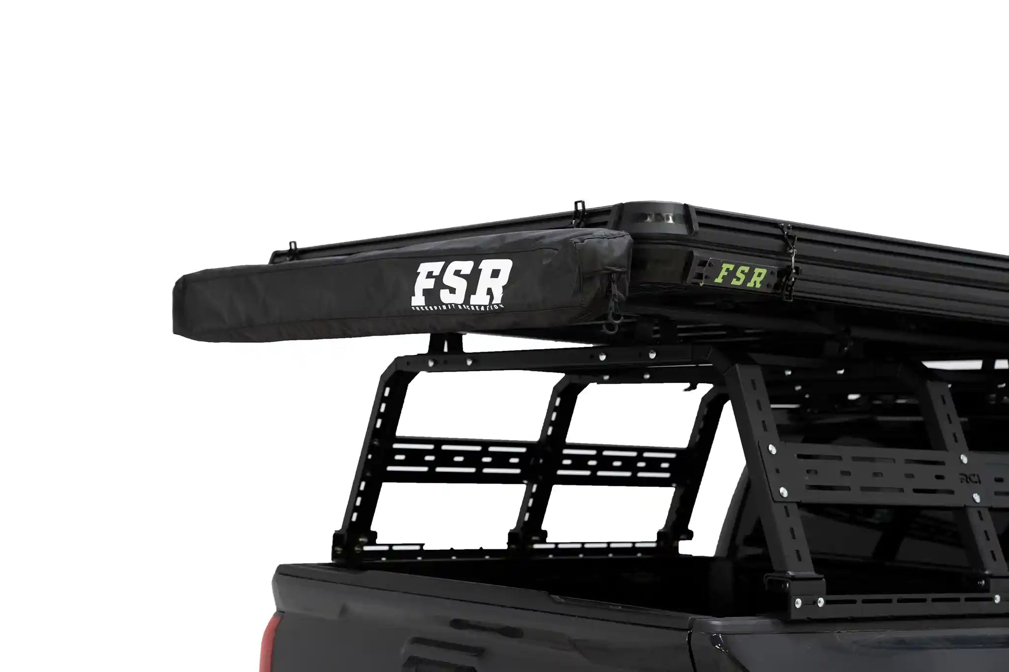 FSR 180 tailgate awning closed up in the zippered storage bag, mounted to a Free Spirit Recreation rooftop tent on the rear of a 4x4 Toyota Tacoma