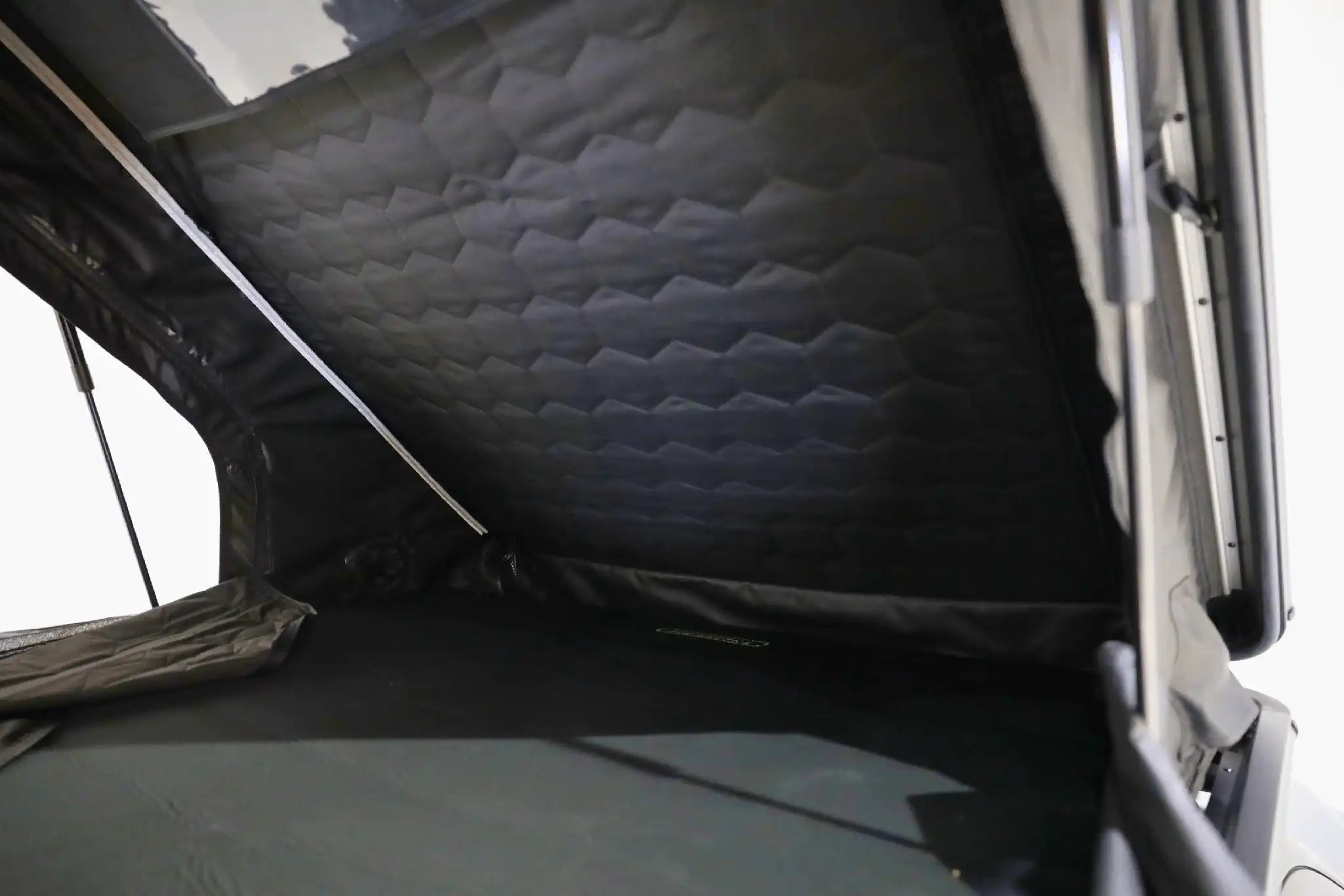 FSR Aspen Pro XL rooftop tent interior showing 52 inch headroom memory foam mattress LED lighting