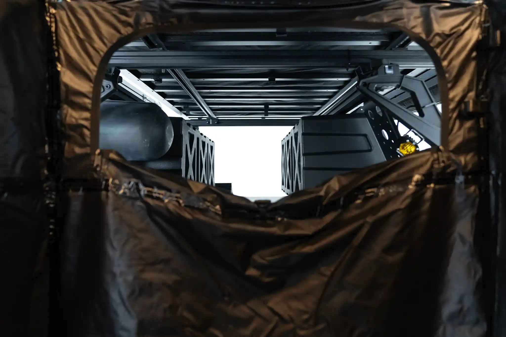 Interior view looking through the window of the FSR Shower Awning for camping and overlanding