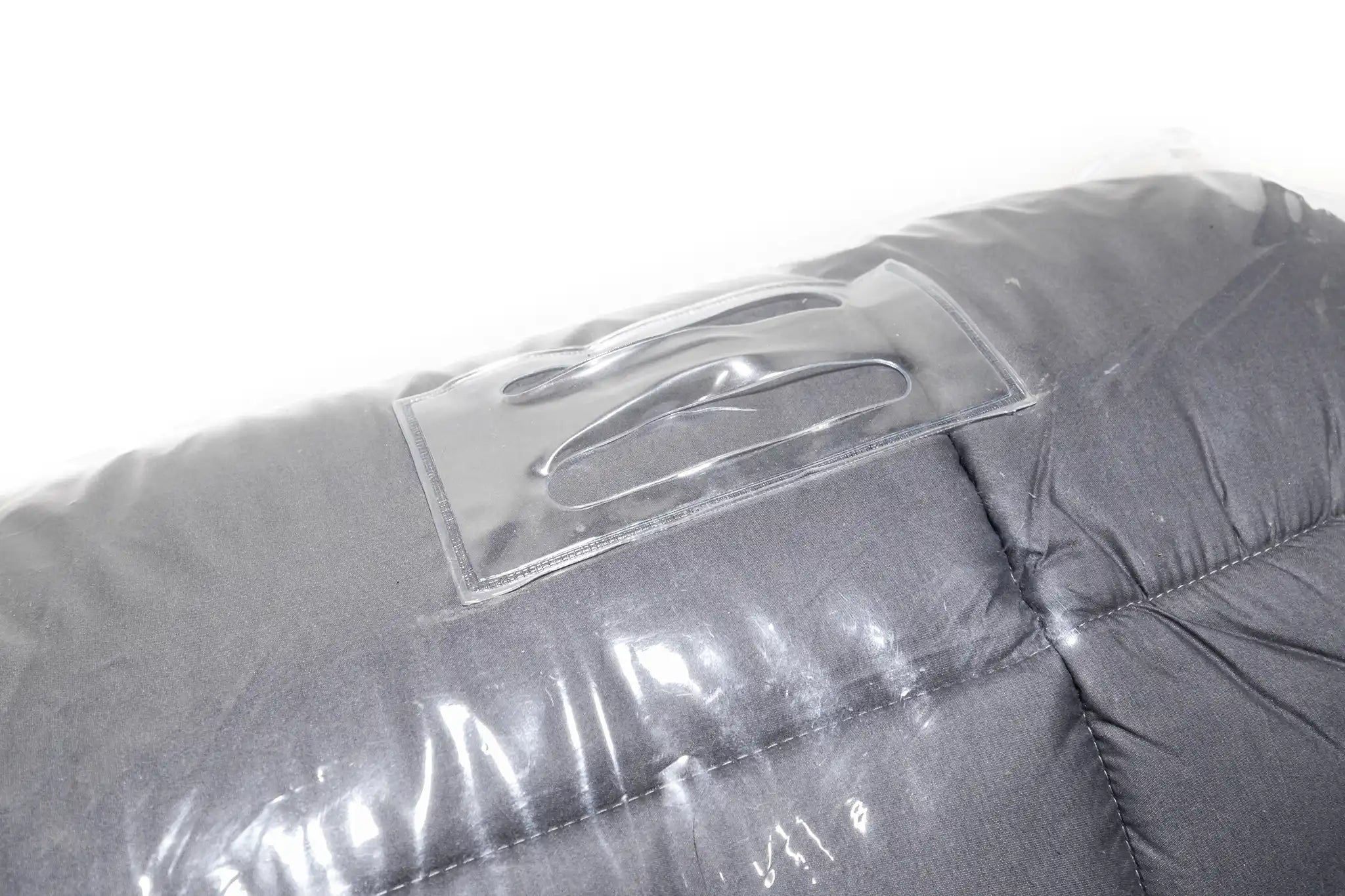Close up image of the storage bag loop on the FSR Cloud Topper rooftop tent mattress topper's clear plastic zippered storage bag