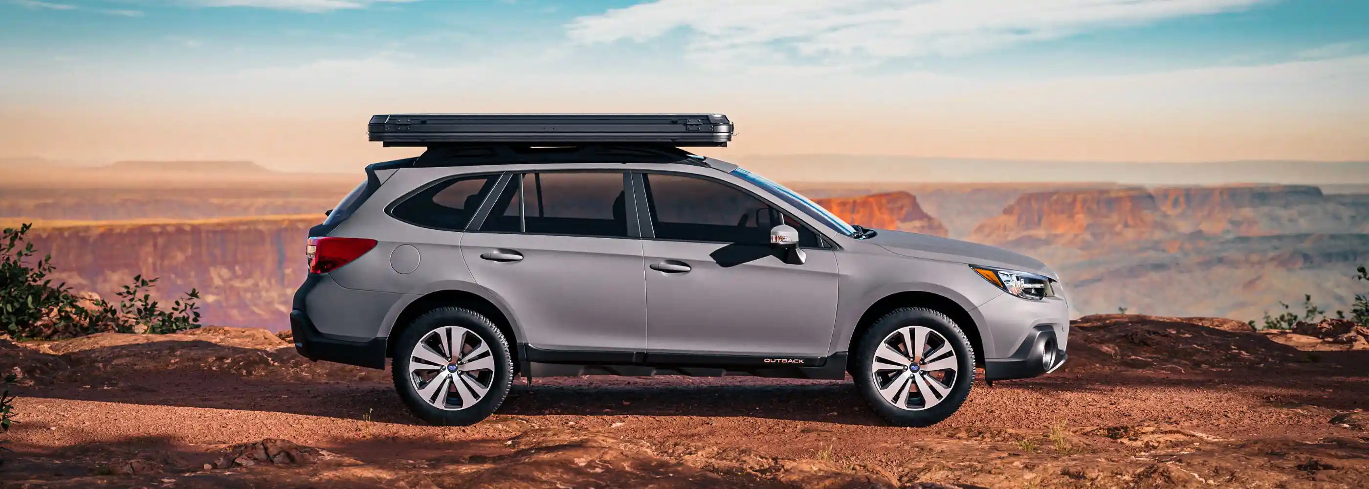FSR Evolution V3 XL rooftop tent mounted on sedan crossover vehicle