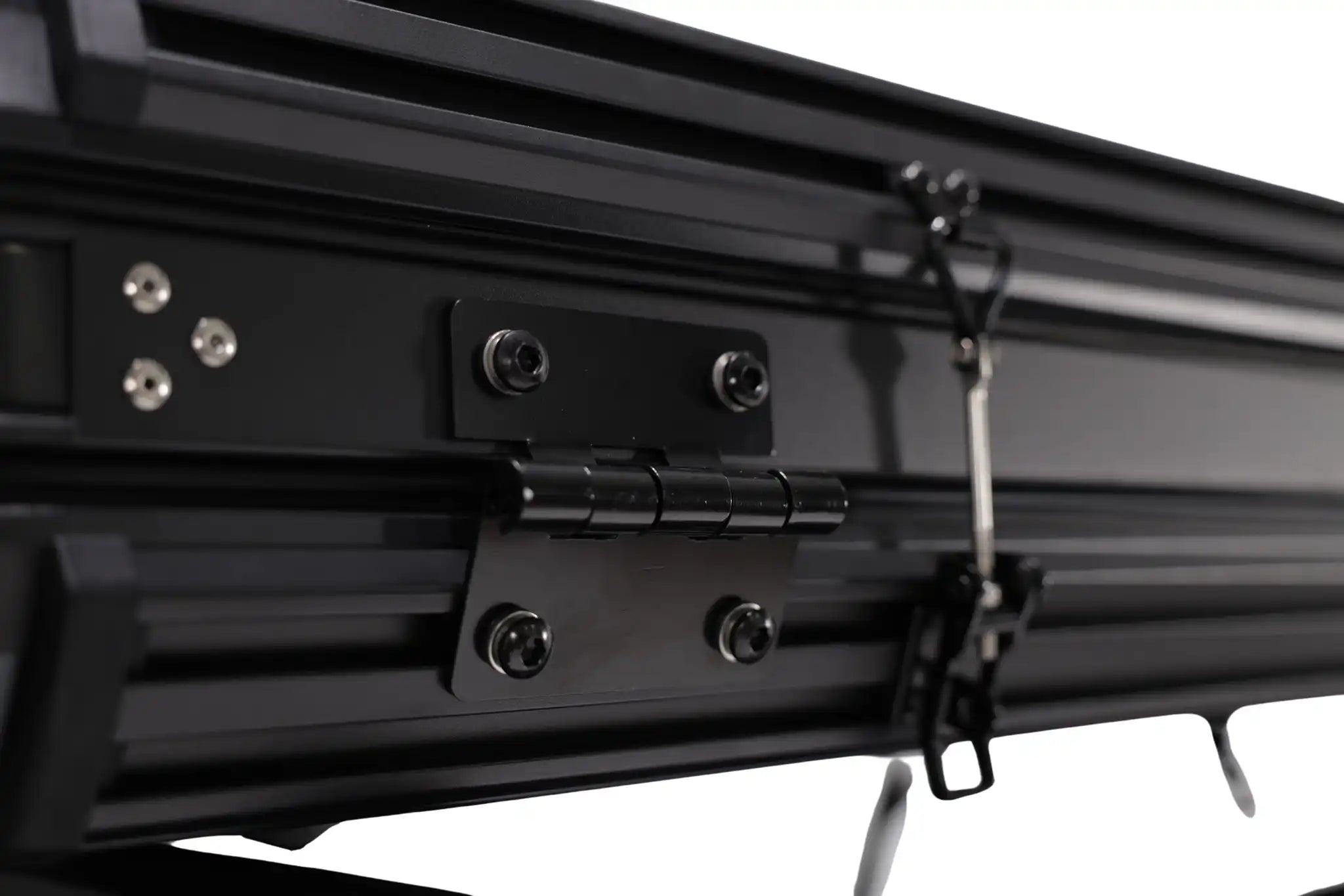 Up close photo of the FSR Evolution V2 Rooftop Tent heavy-duty hinge mechanism.