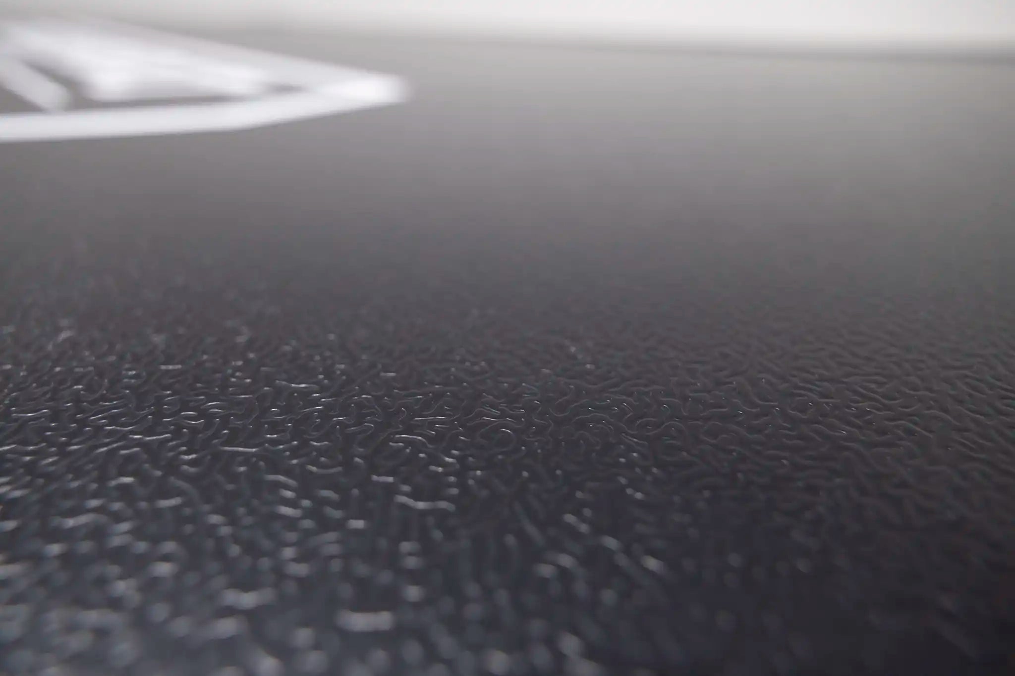 Close up photo of the honeycomb aluminum top shell on the FSR Evolution V2 rooftop tent from Freespirit Recreation