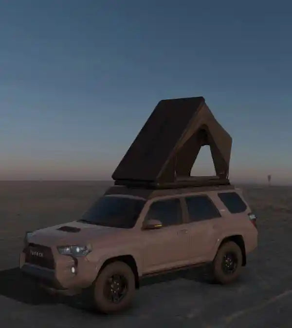 3D model rendering of an SUV with a Freespirit Recreation rooftop tent installed a desert landscape