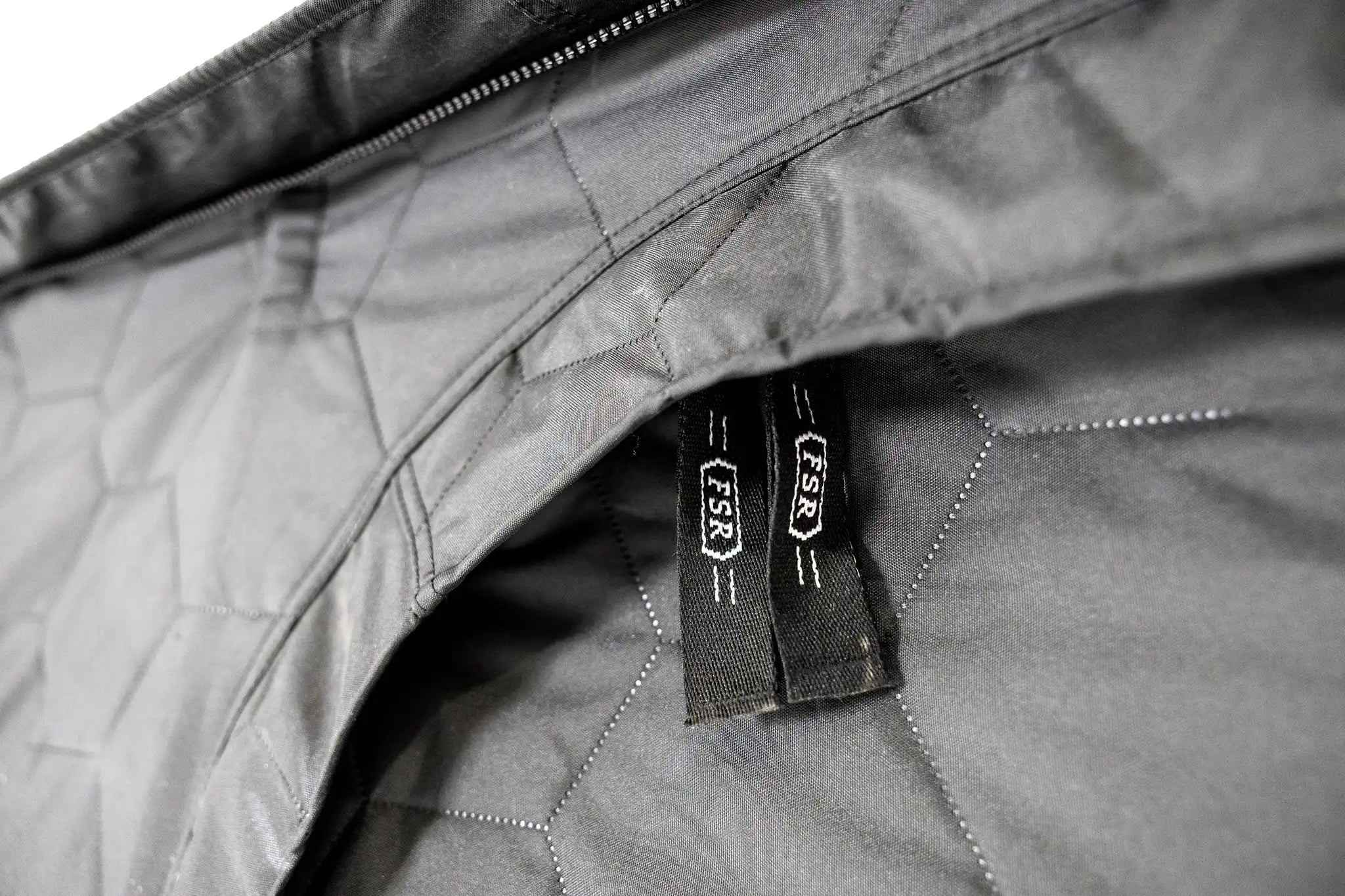 Close up of the branded zipper on the FSR Hub 6XL Tent pop up 6 Person family camping and glamping tent from Freespirit Recreation