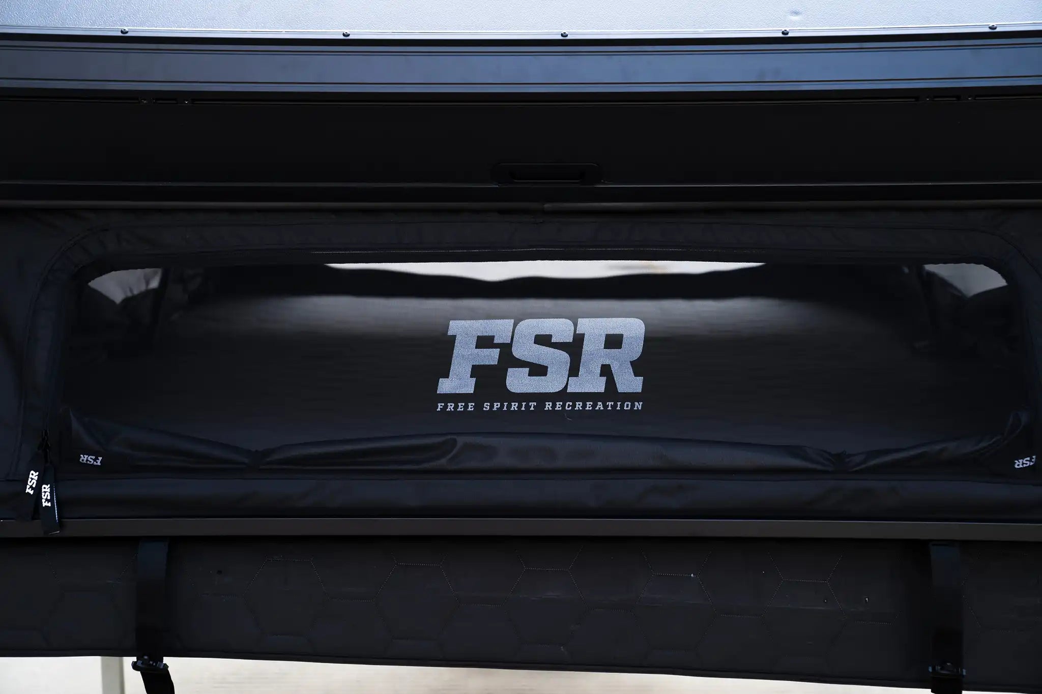 Close-up image of the open rear-window on the FSR Kali King rooftop tent from Freespirit Recreation showing the premium mesh and trim-layer tent materials