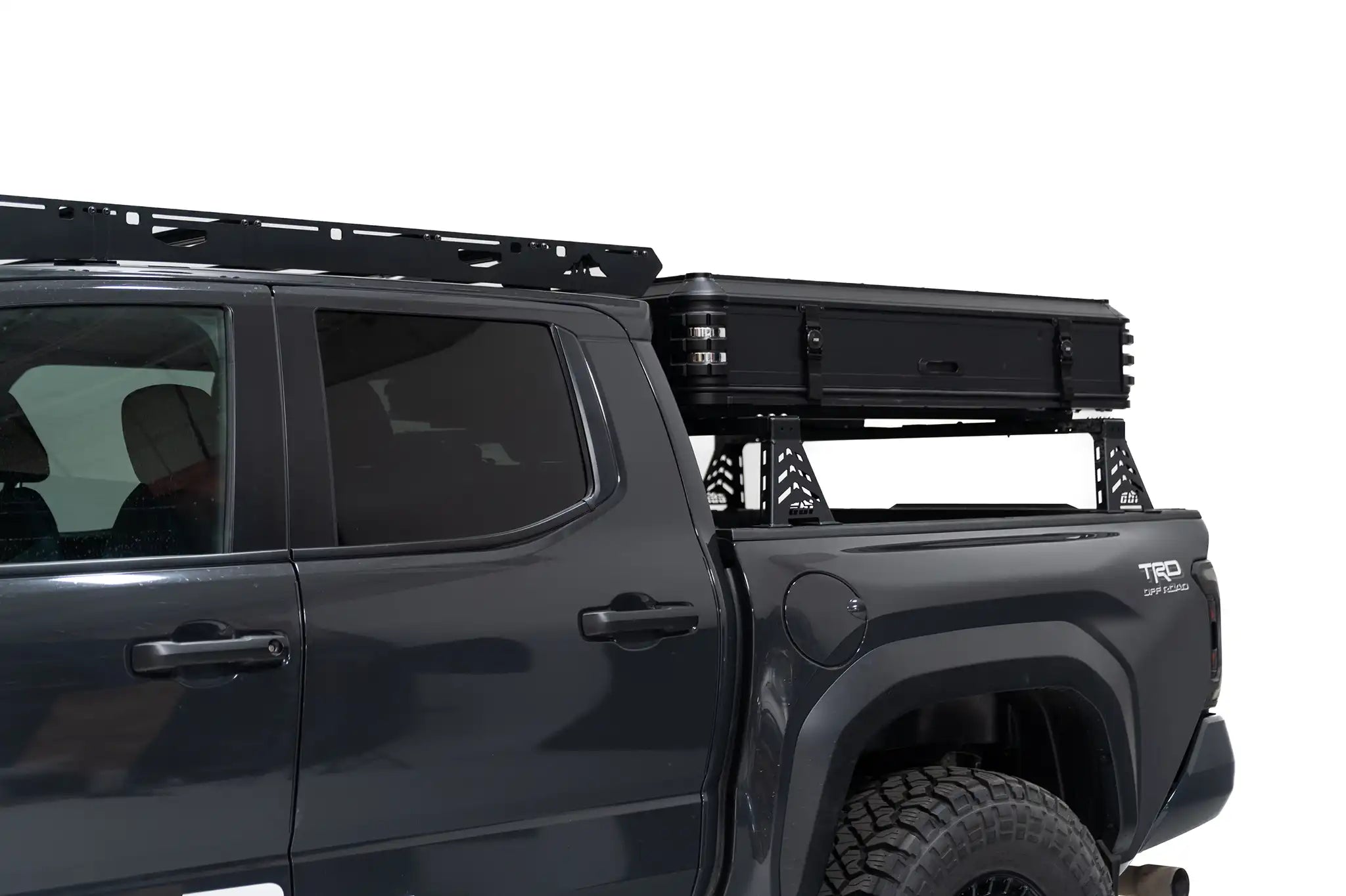 Close up front angle Exterior Photo of Kali hardshell rooftop tent by FSR - Closed on the truck bed of a 4th gen Toyota Tacoma.