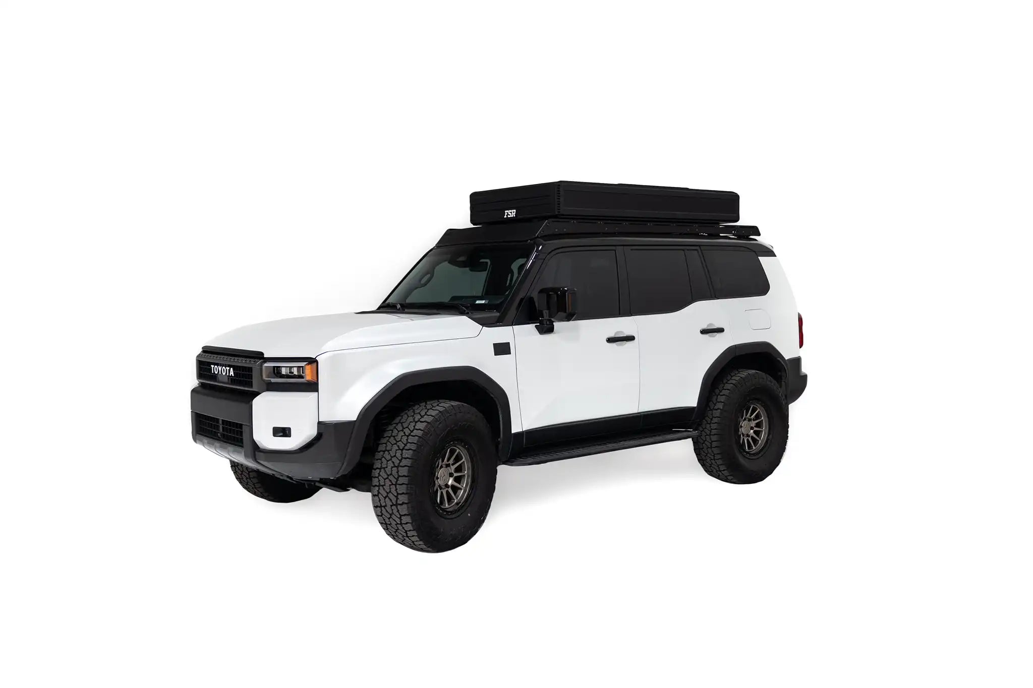 Exterior photo of the closed FSR Nova King rooftop tent mounted on a white Toyota Land Cruiser 250.