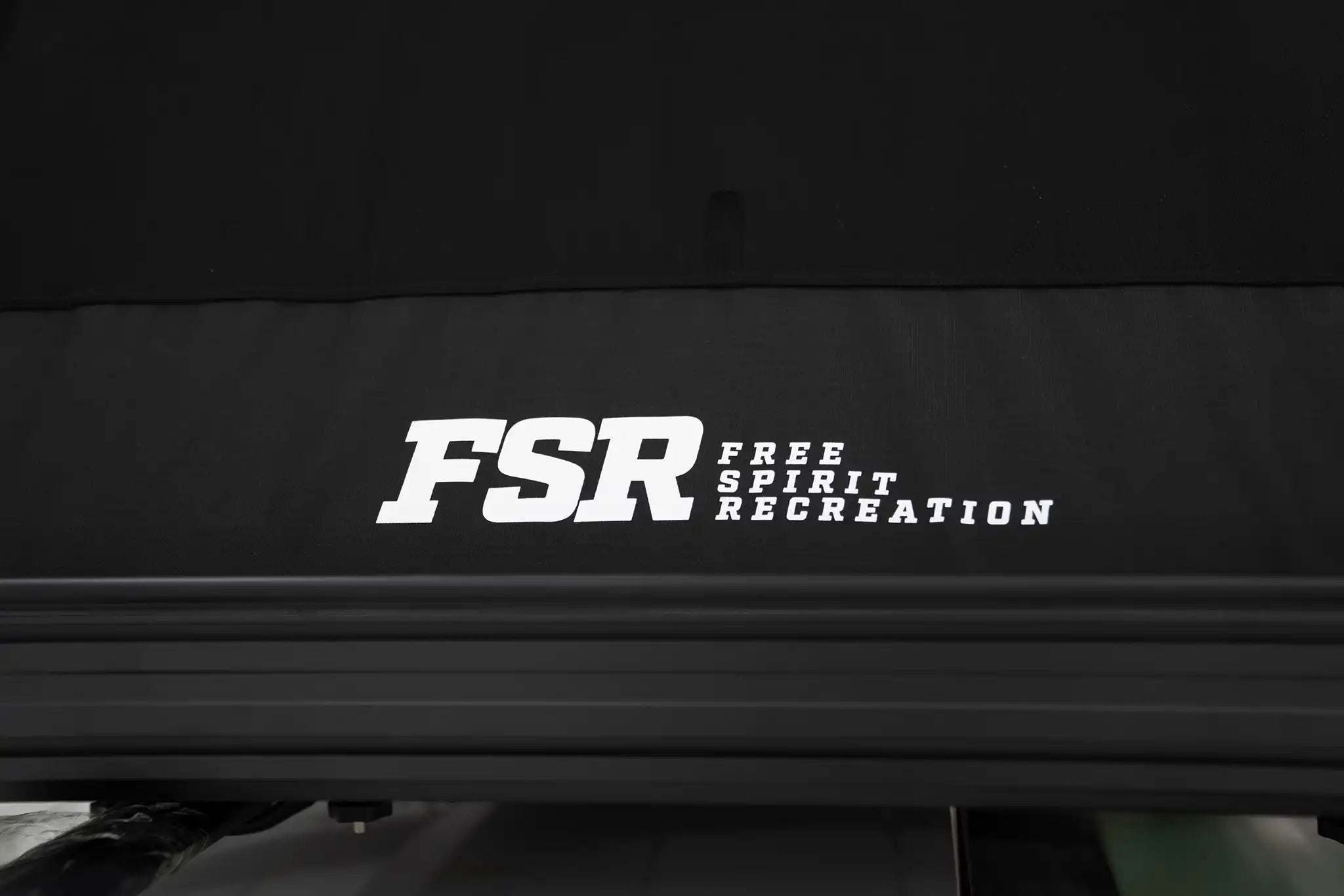 Up close rear photo of FSR Nova rooftop tent branding.
