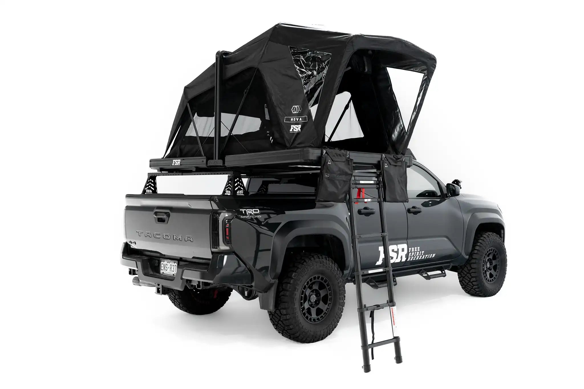 Rear angle photo of FSR Nova rooftop tent deployed on the rear of a 2025 Toyota Tacoma with ladder down.