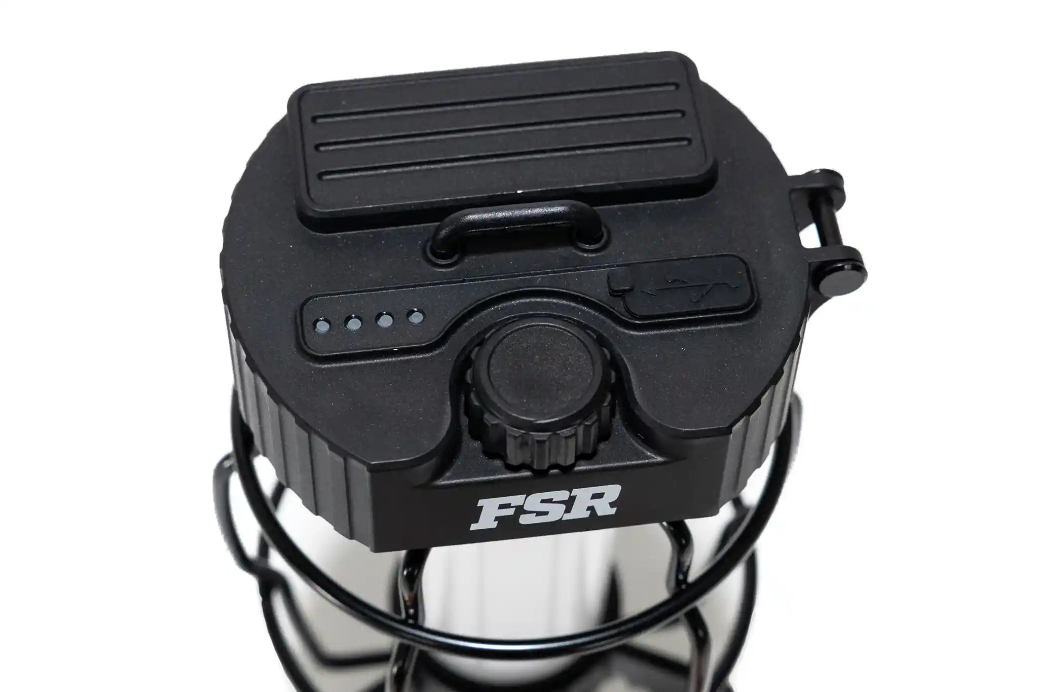 Close up image of the top of the FSR Portable LED Camping Lantern from Free Spirit Recreation showing the charging port and adjustable dimmer switch