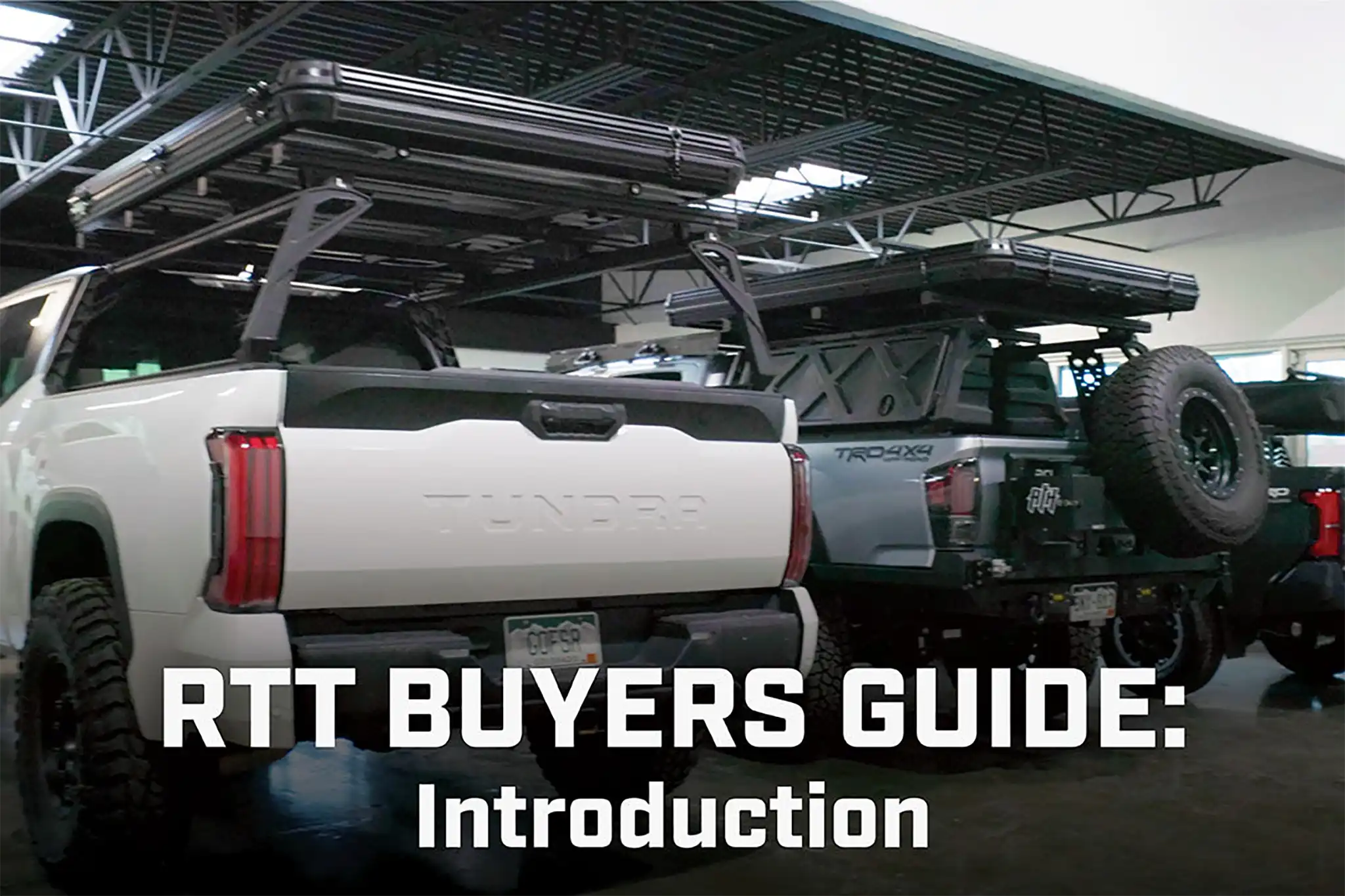 Several Toyota trucks with bed racks fitted with various FSR Rooftop Tents from Free Spirit Recreation