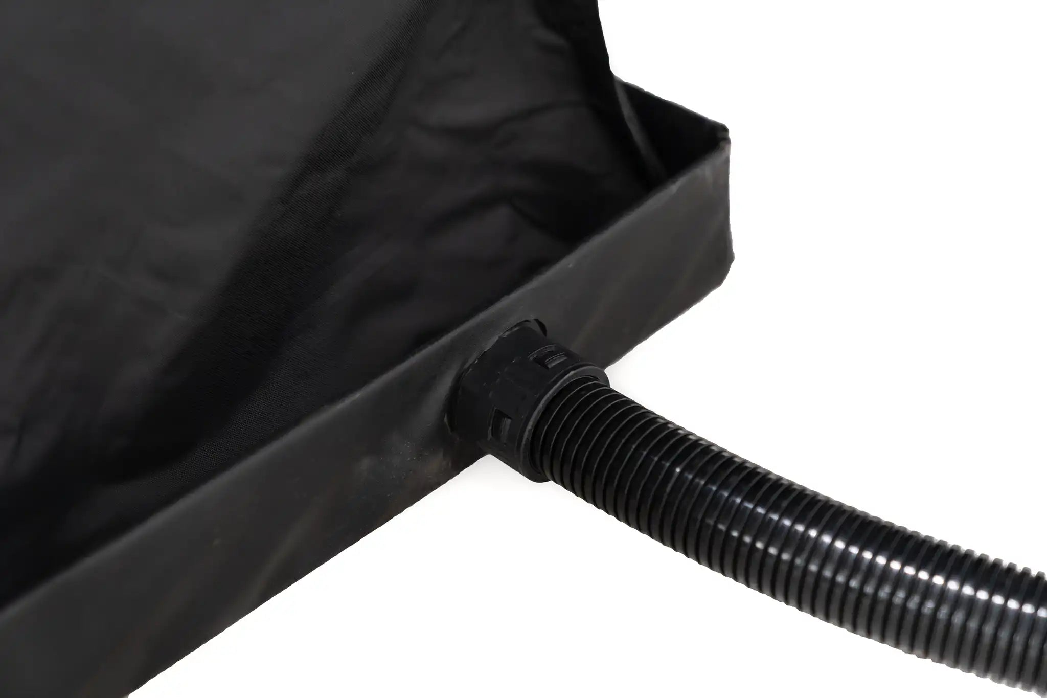 Close up image of the FSR Shower Awning removable floor pan drain hose connection